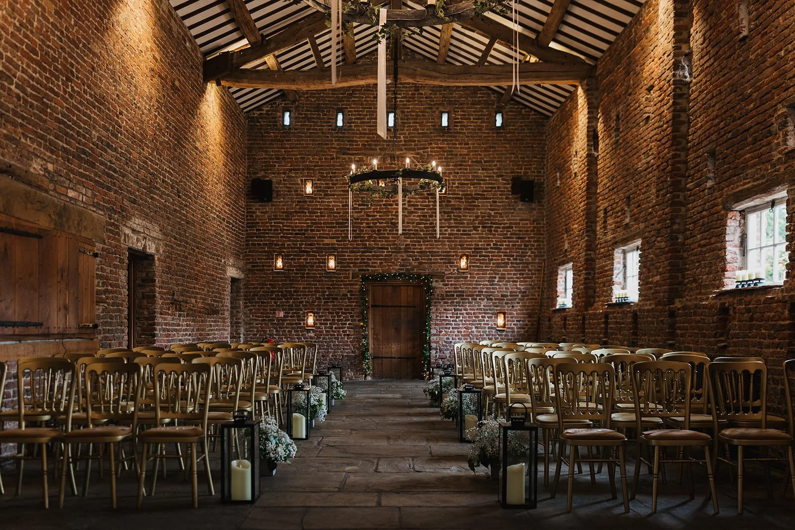 Meols Hall wedding Photography showing the inside of the barn set for a wedding ceremony.