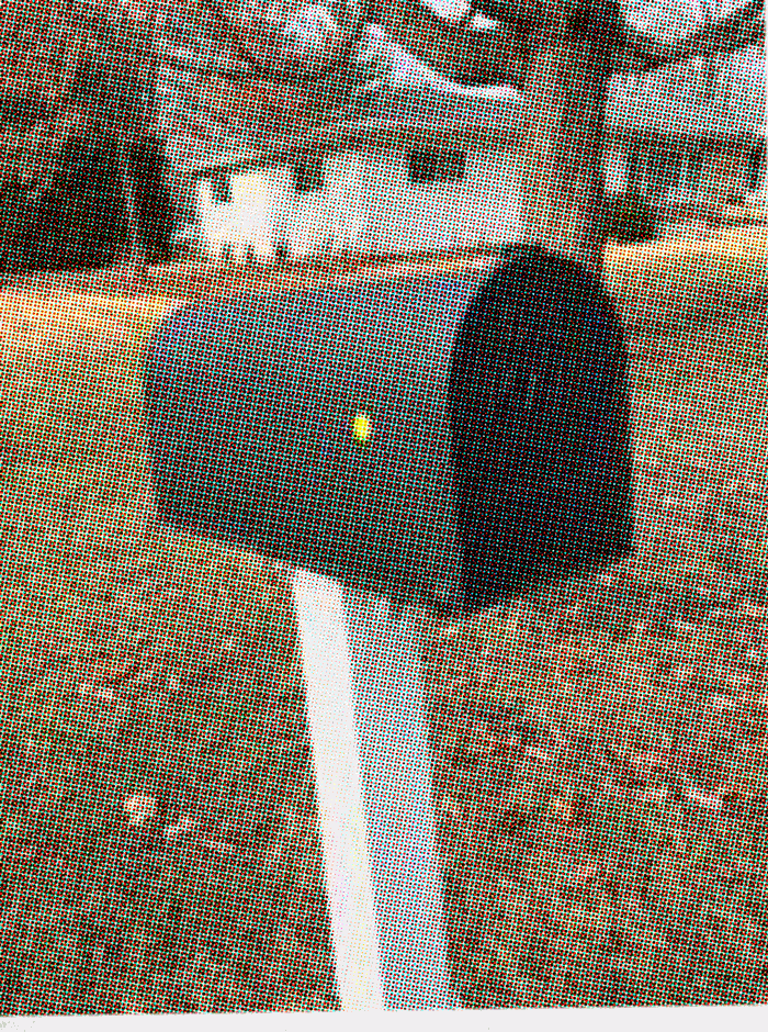 Colourful circle dot stickers on everyday photos of mailboxes.