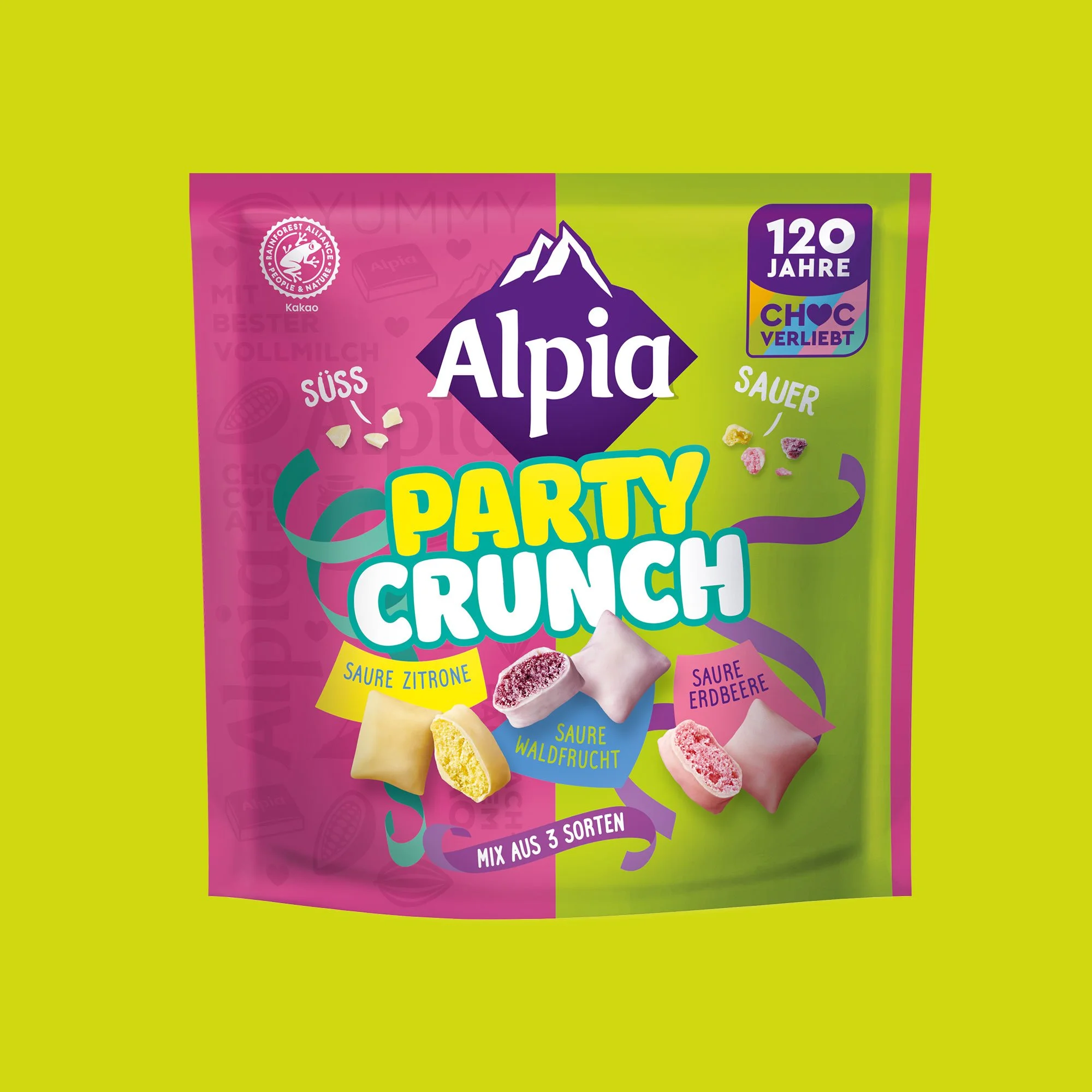 Alpia Party Crunch – saure Getreidekissen in Waldfrucht, Zitrone und Erdbeere, umhüllt von weißer Schokolade – süß, sauer und knusprig.