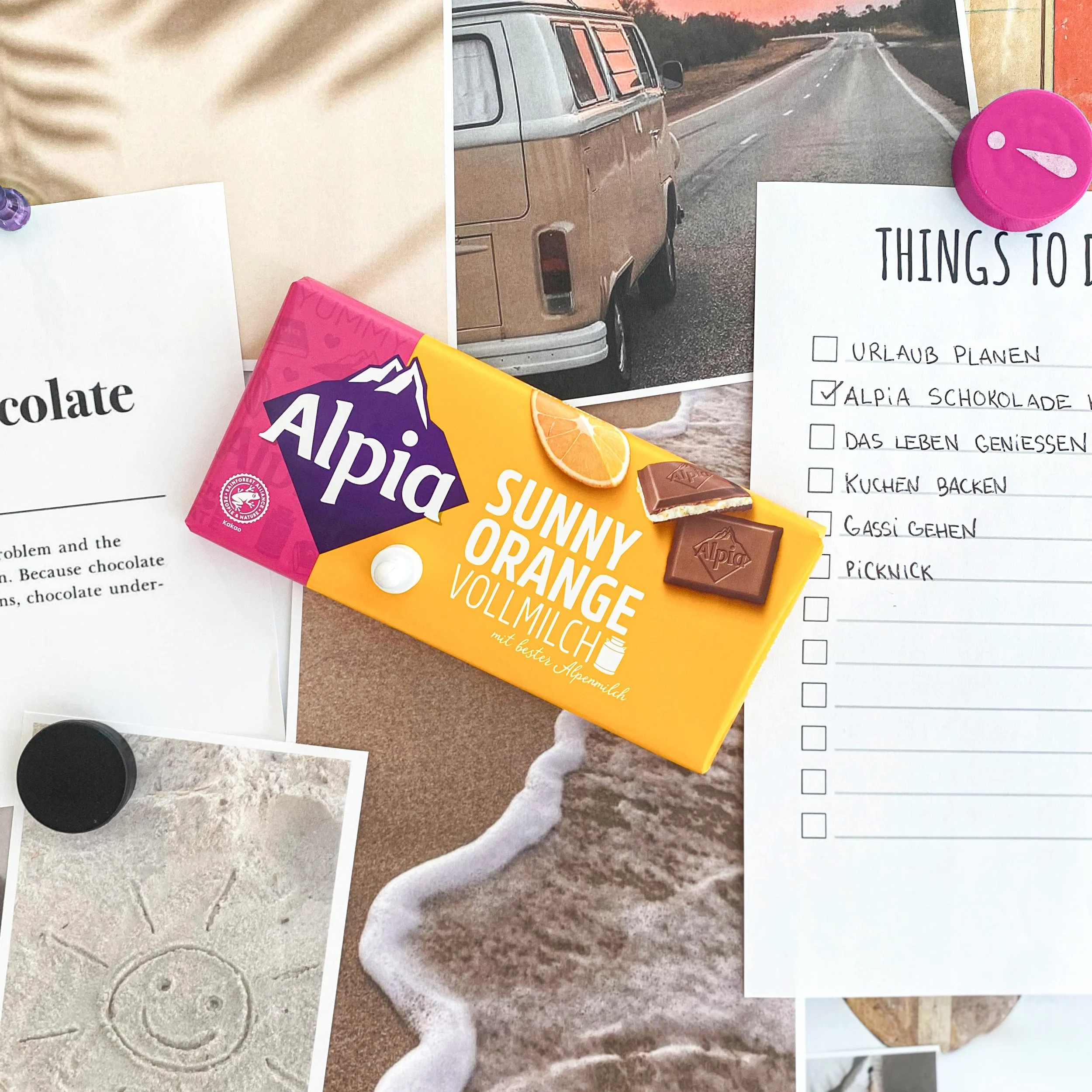 Alpia Sunny Orange Schokoladentafel auf Pinnwand mit To-do-Liste und Urlaubsplanung