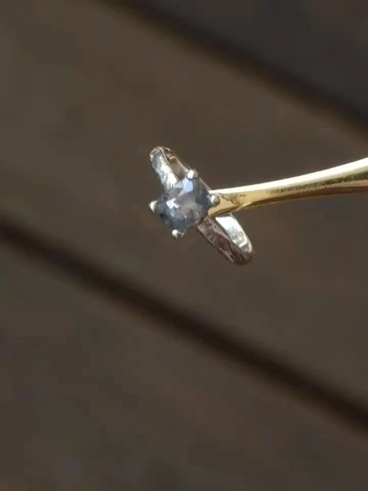Organic silver  band holding a one-of-a-kind grey/blue spinel with speckles of brown - of my favourite gems I&rsquo;ve had the pleasure of designing around 🤎