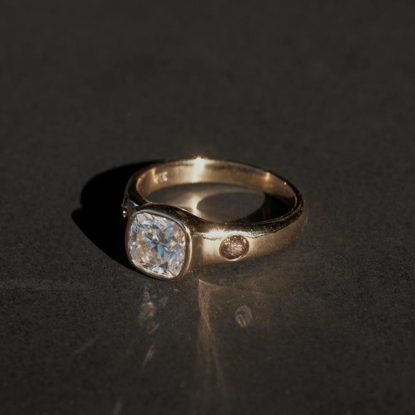 Big stone energy with this recent custom engagement ring 😍

9k Yellow gold set with a 1.5 carat Moissanite and two Brown Diamonds 🤎