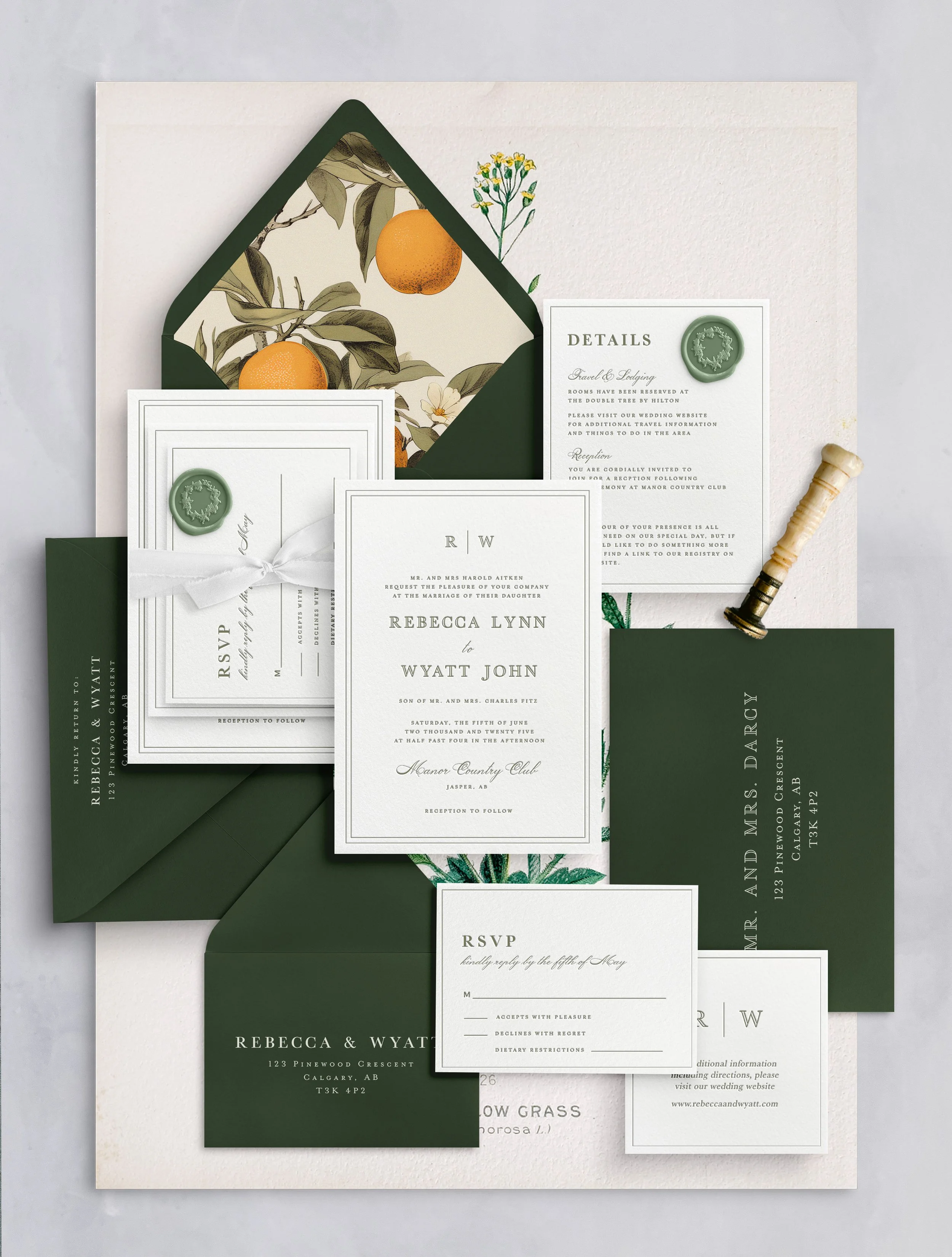 Wedding invitation suite with dark green, white, and botanical accents, including invitation cards, RSVP cards, envelopes, and details cards, arranged on a light background.