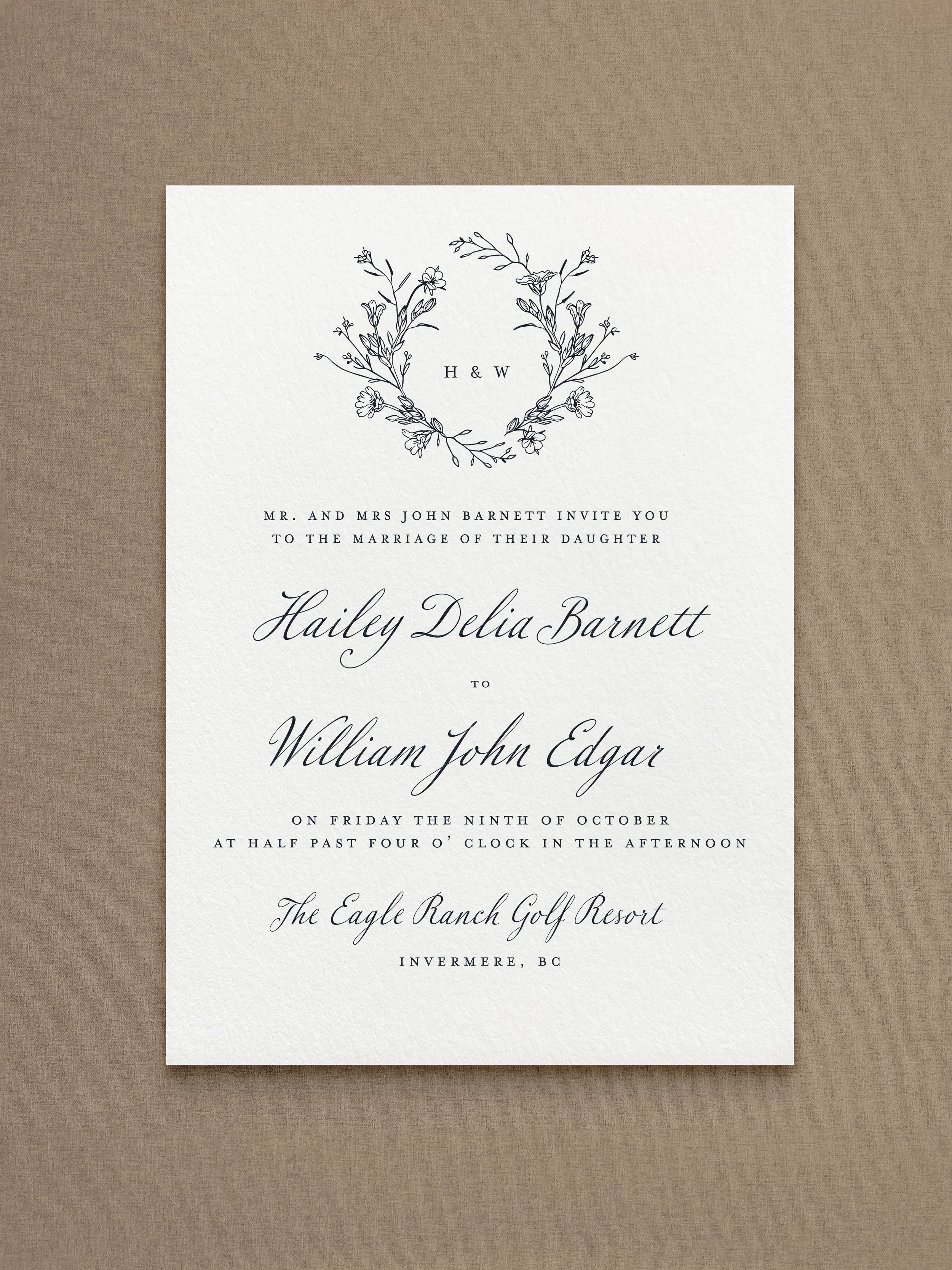 Elegant wedding invitation card with floral illustration at the top, featuring names Hailey Delia Barnett and William John Edgar, details of the wedding date, time, and venue.
