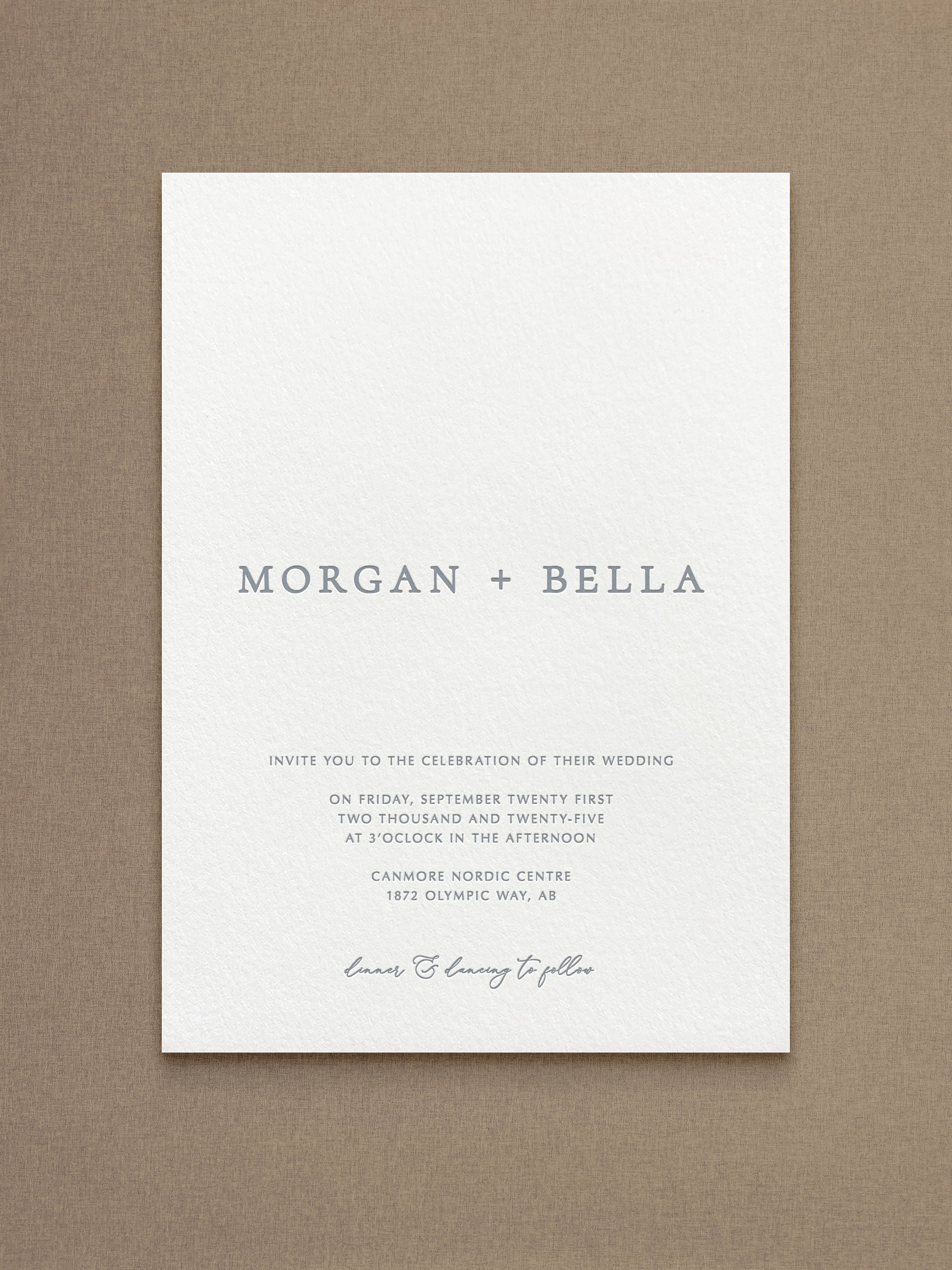 Wedding invitation for Morgan and Bella, with details of the date, time, and location, on a textured white paper background.