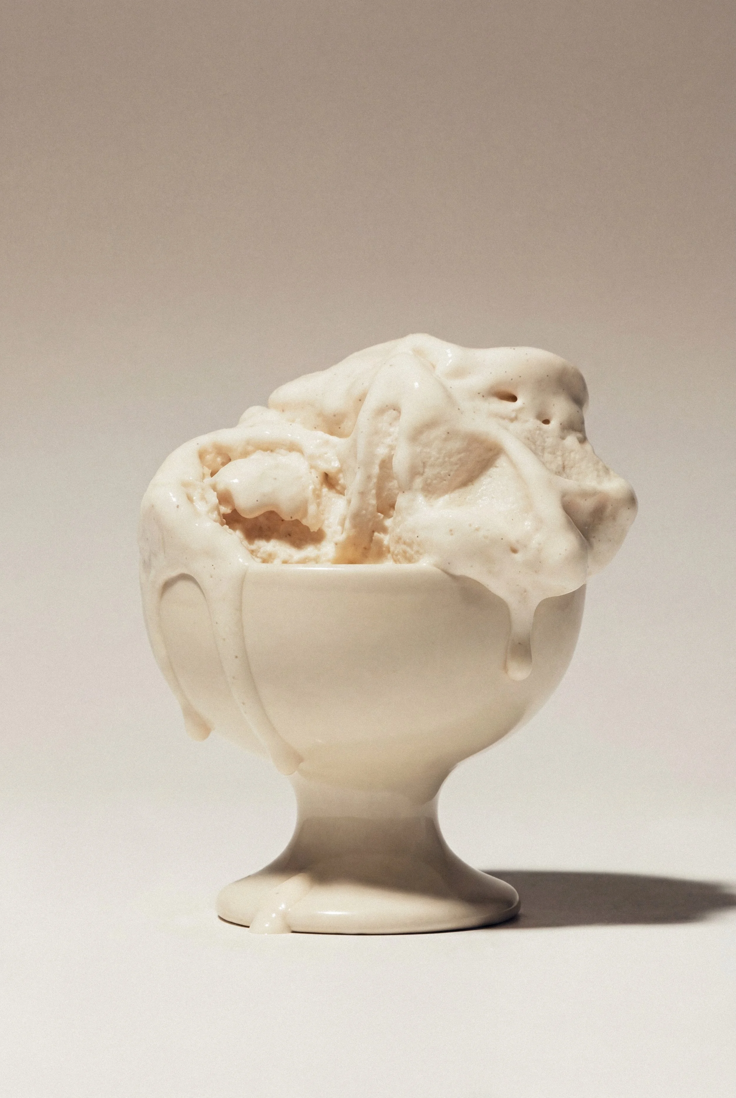 vanilla ice cream in ceramic bowl