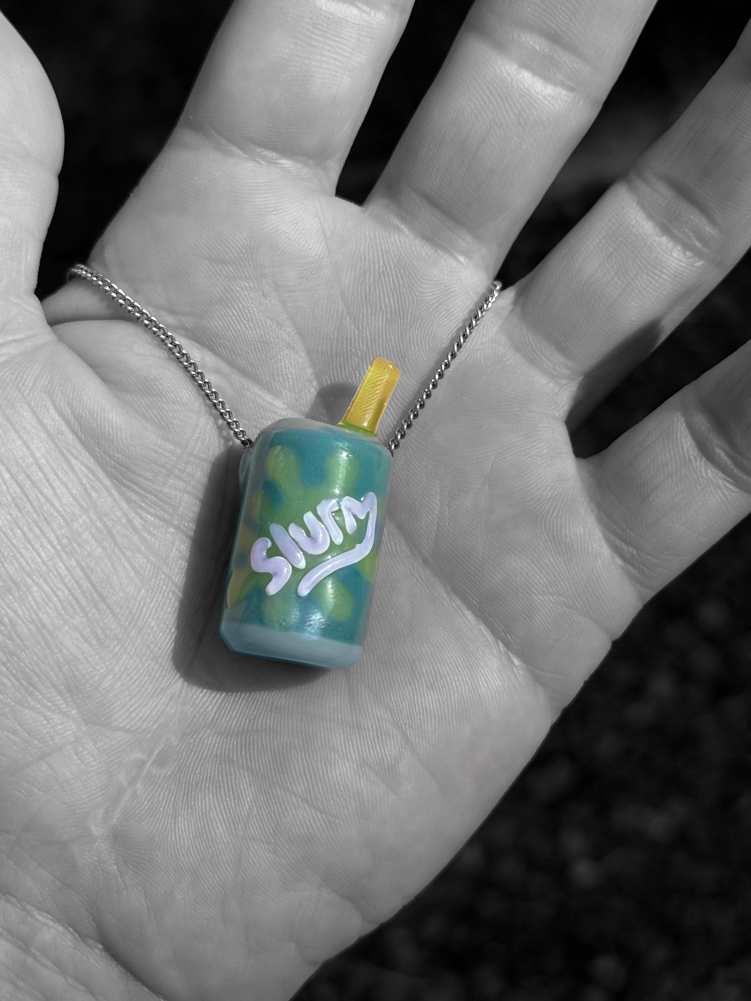 J Smart Glass Pendants Slurm Can UV reactive hand mixed colors front chain.jpg