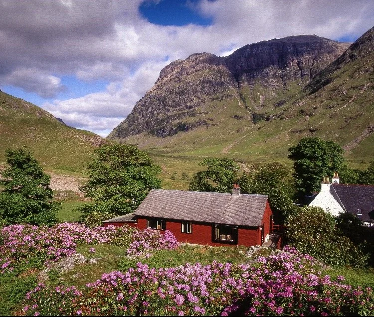 Fresh green hills of the Scottish Highlands in spring morning light