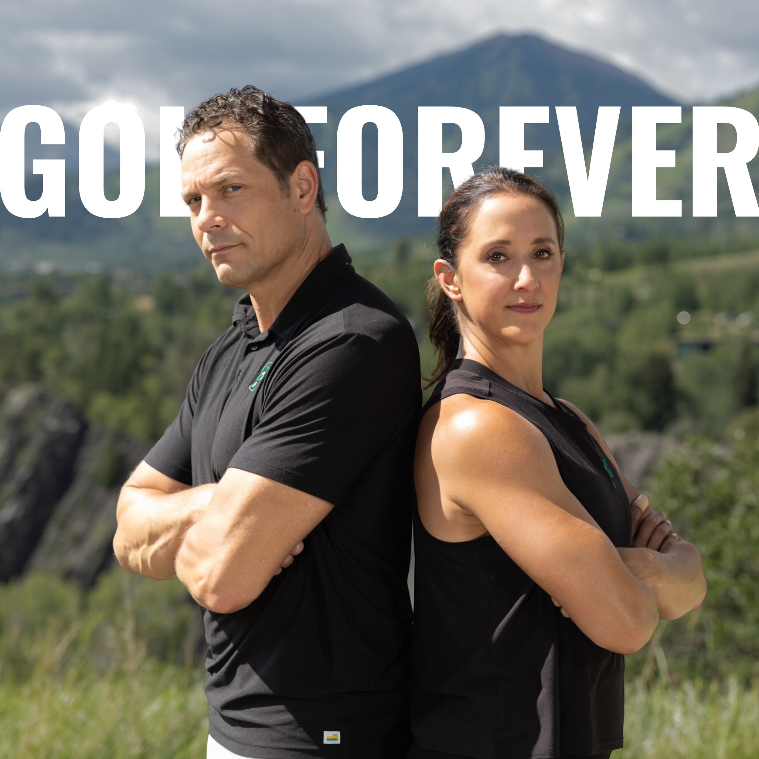 Two people in sports attire standing back-to-back outdoors with "GOLF FOREVER" text above.