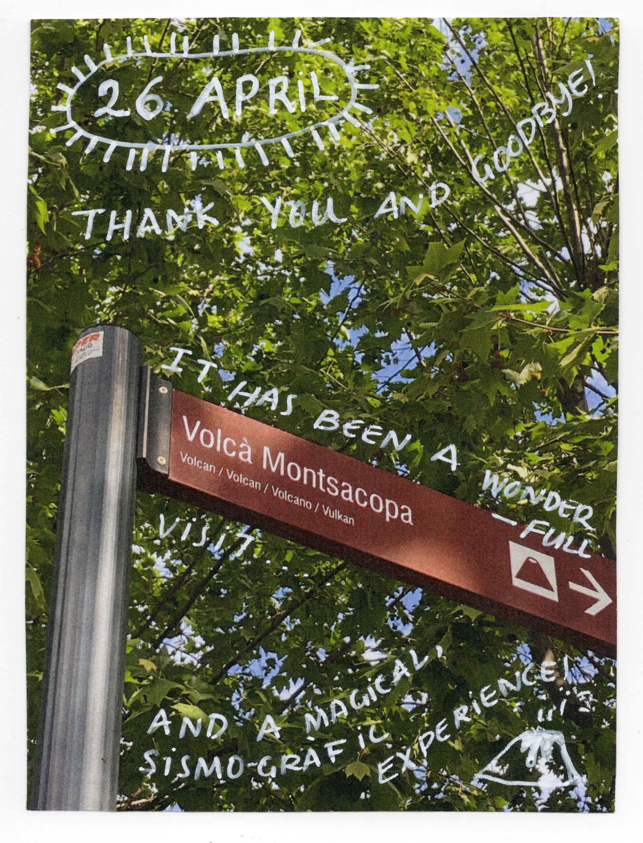 Signage showing the way to a venue with leafy trees in the background, with handwritten text overlaid on the image
