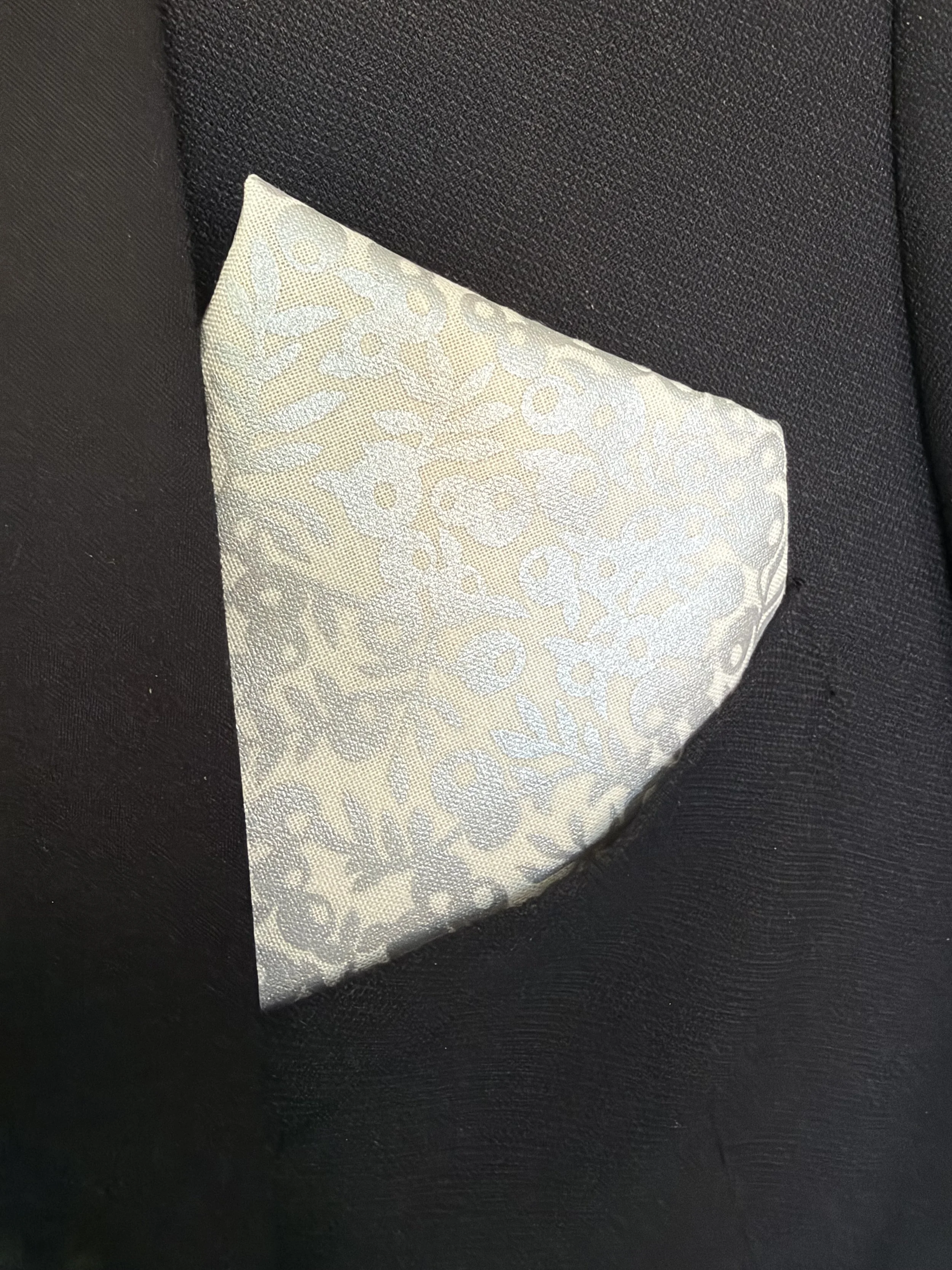 Handmade sewjackie  pocket square in liberty fabric, featuring silver metallic berries on a creamy white fabric