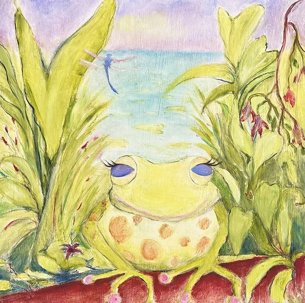 A whimsical watercolor painting of a yellow frog with pink spots, sitting among green plants near a body of water with a dragonfly flying above.