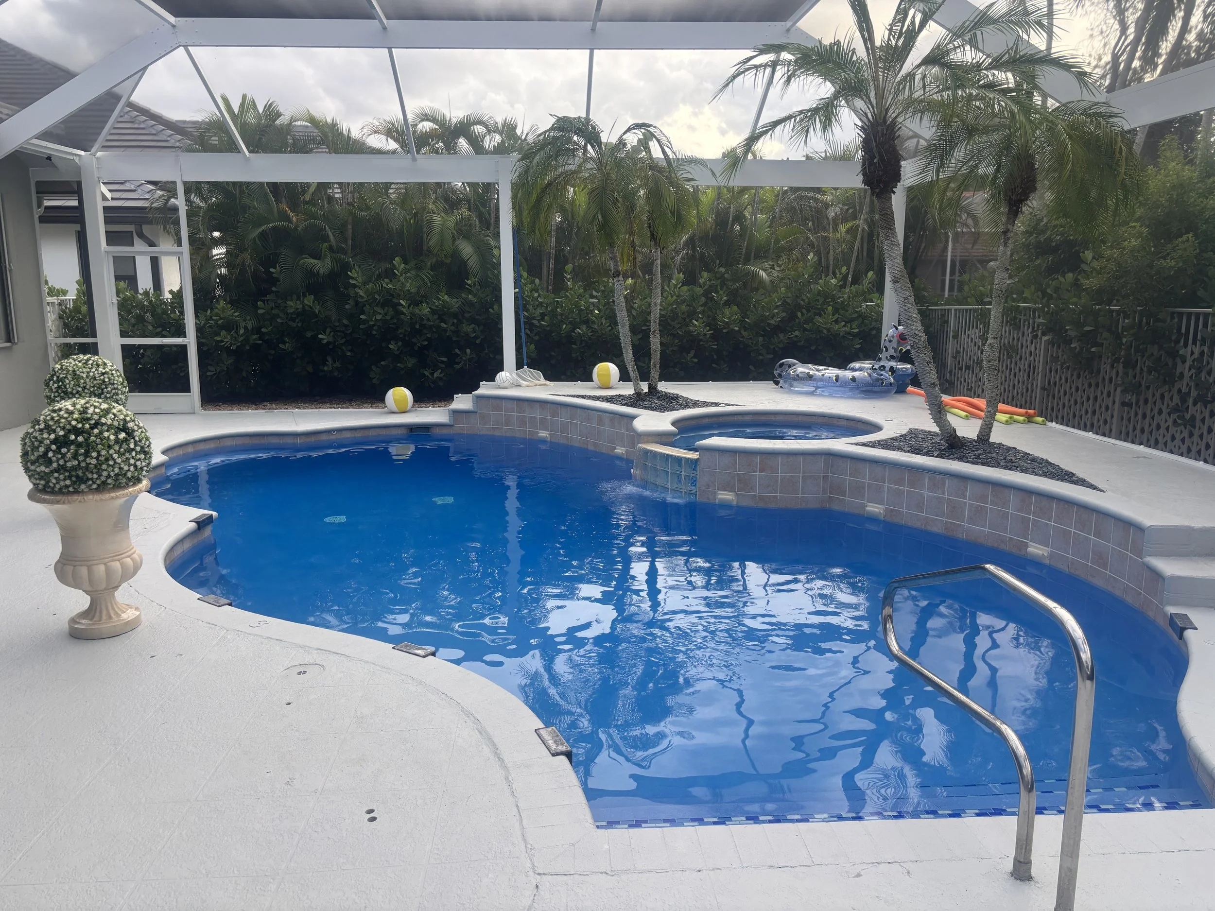 Azure midnight blue diamond brite florida stucco resurfacing with clear water after pool maintenance