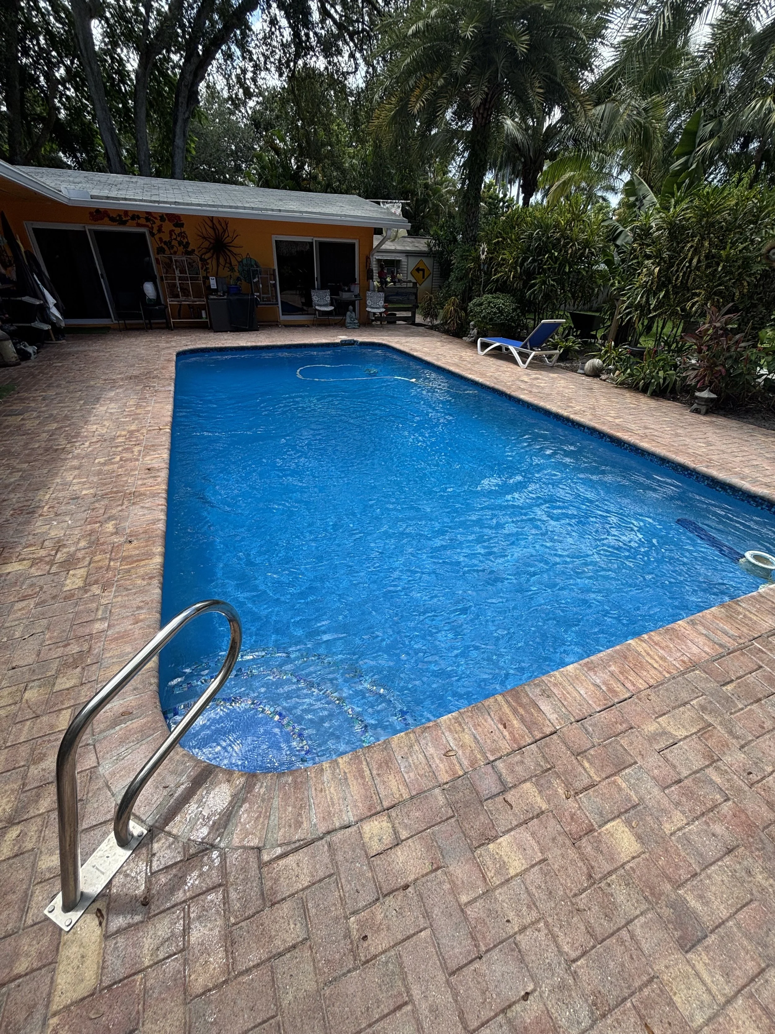Blue Axure pool with clean clear water after shock and maintenace