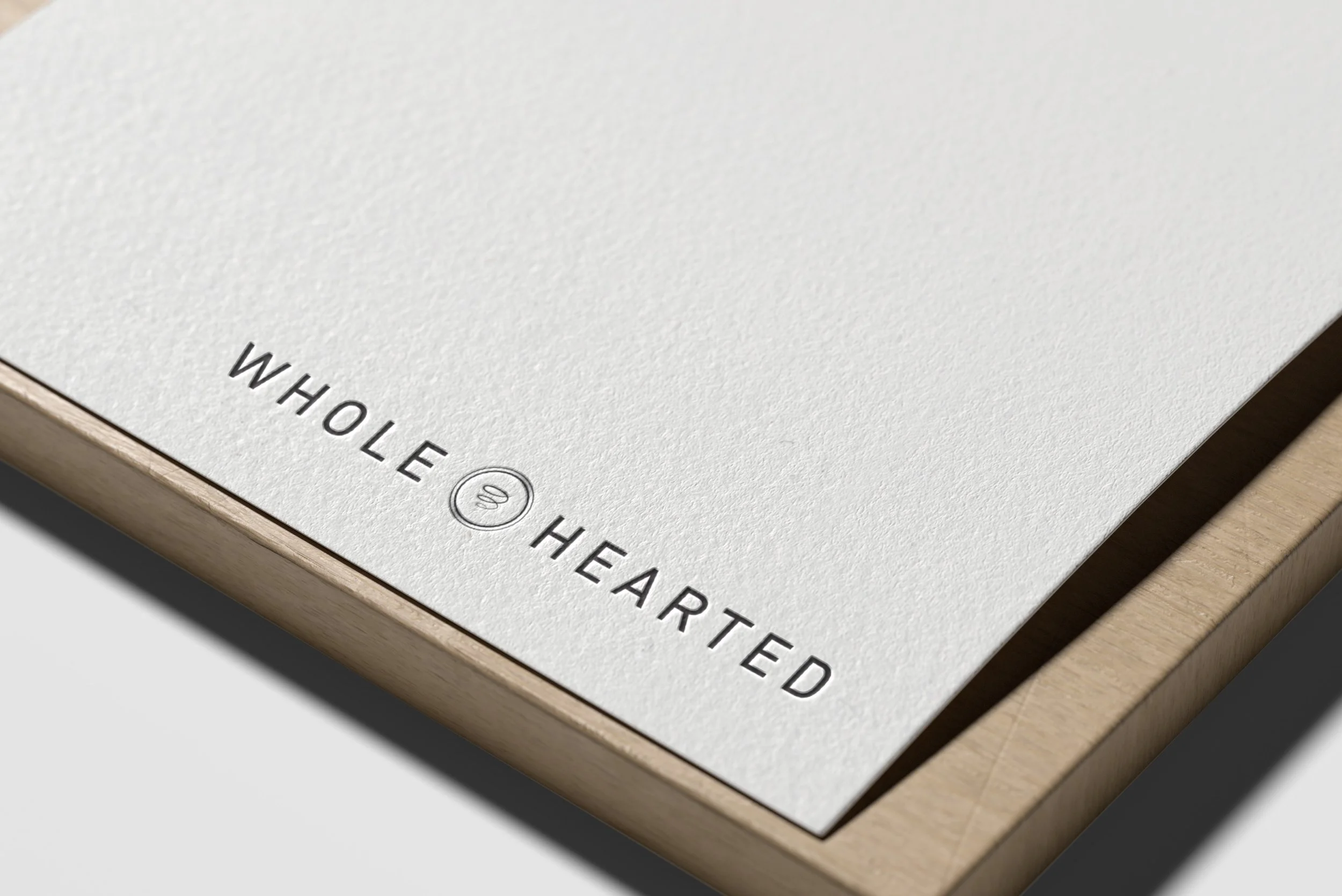 Logo Mockup on White Paper.jpg