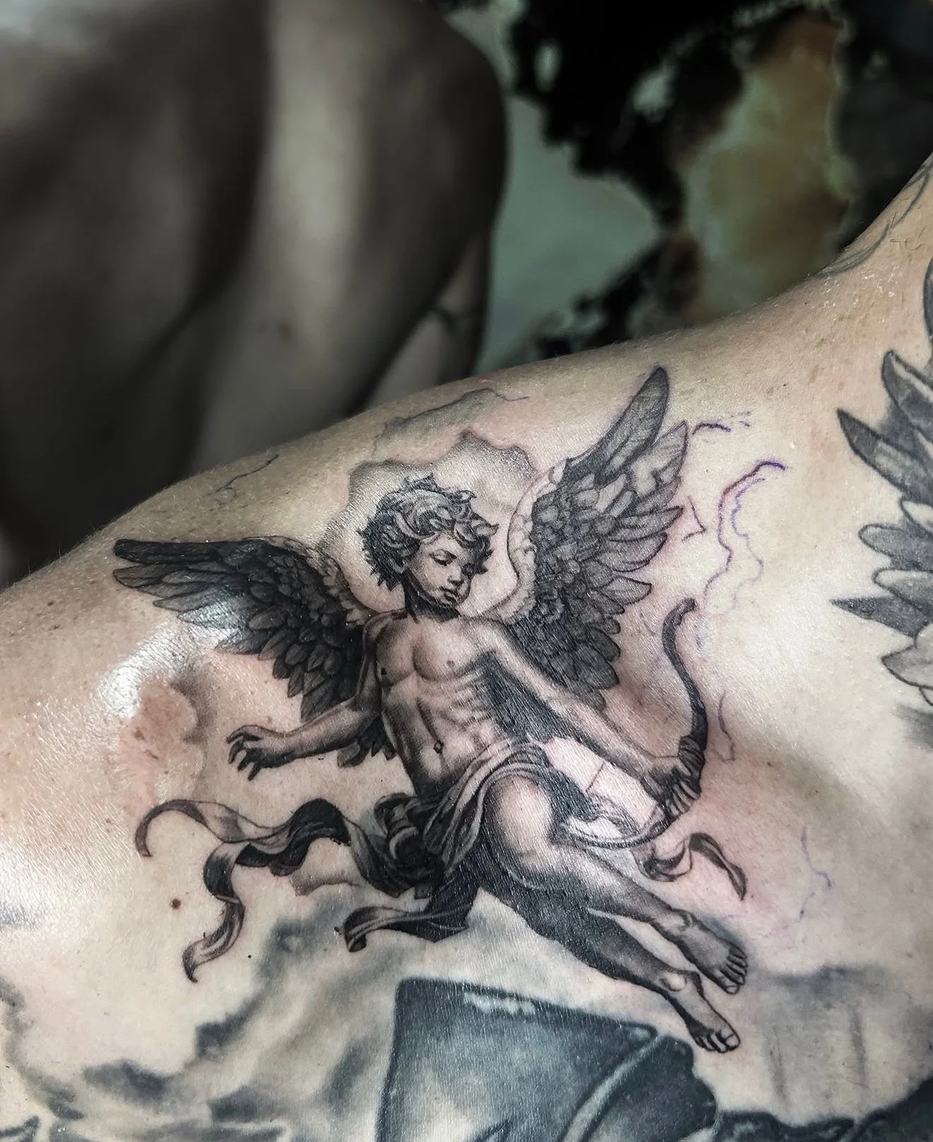 black and gray angel tattoo by Malaki