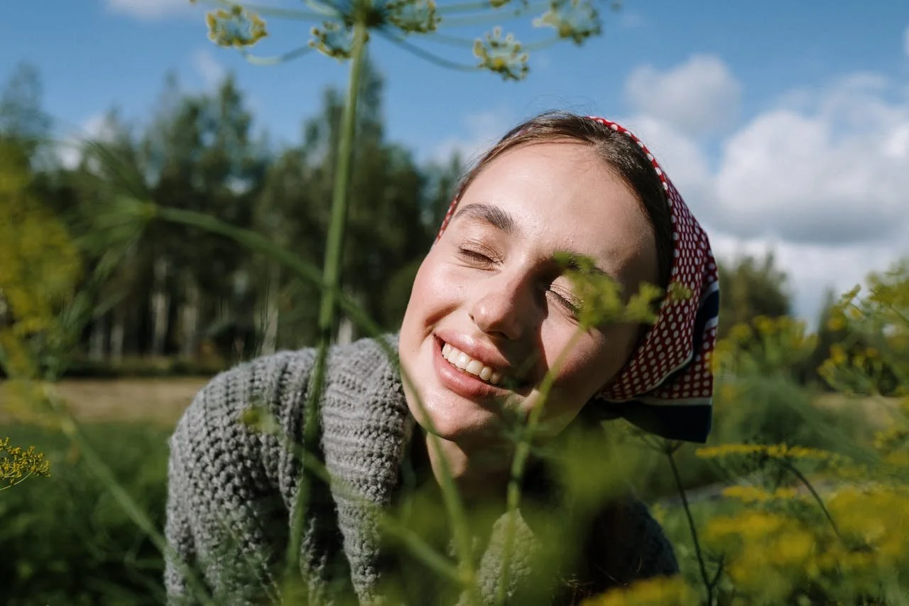 portrait-of-a-woman-with-a-headscarf-smiling