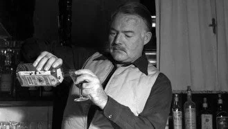 Hemingway&rsquo;s drinking was more deliberate than the mythology suggests. During his Paris years, he developed a habit of mentally cataloging the caf&eacute;s and bars where he revised or reflected on his work, often pairing those places with speci