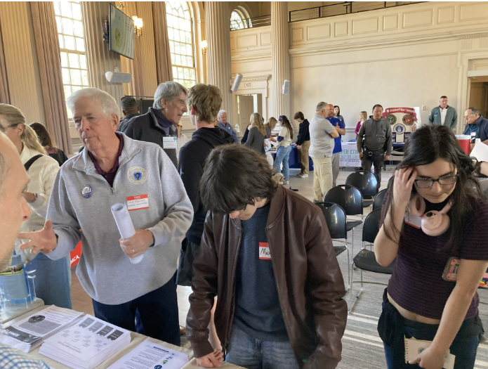 Newton Civics Spotlight: Students, educators, elected officials and community members who strengthen civic engagement in Newton set up booths at City Hall.