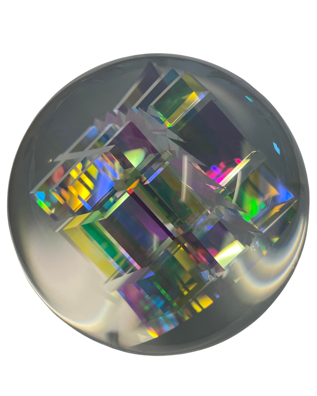 complex polyhedron dichroic glass encased in clear glass sphere