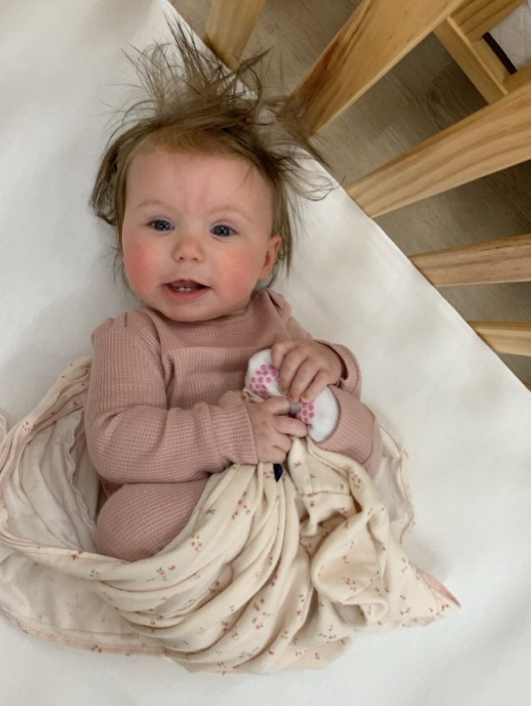 Crib hair. Don&rsquo;t care. 🩷
&bull;
&bull;
&bull;
&bull;
Disclaimer: That is in fact her sleep sack, not a blanket. She was just waking up.😘