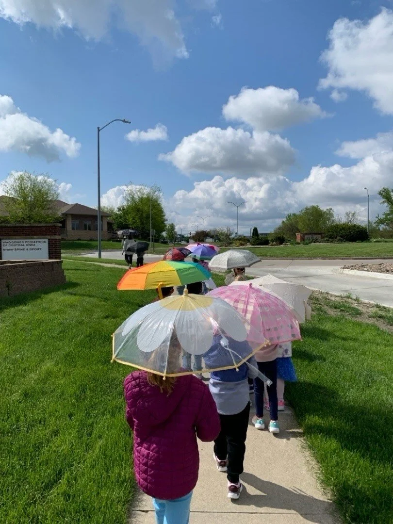 Umbrella walk. Rain or shine! They don&rsquo;t care! ☂️🌂☔️☀️