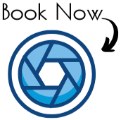 Icon of a camera shutter lens with a circular design, as a hyperlink to request more information about booking the photo bus