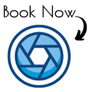 Icon of a camera shutter lens with a circular design, as a hyperlink to request more information about booking the photo bus