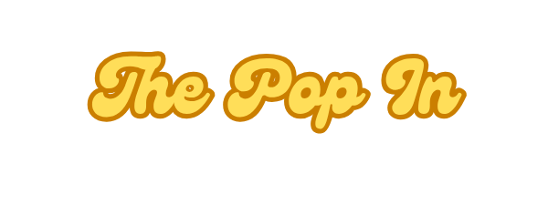 Text that says "The Pop In" in yellow, cursive font with an orange outline.
