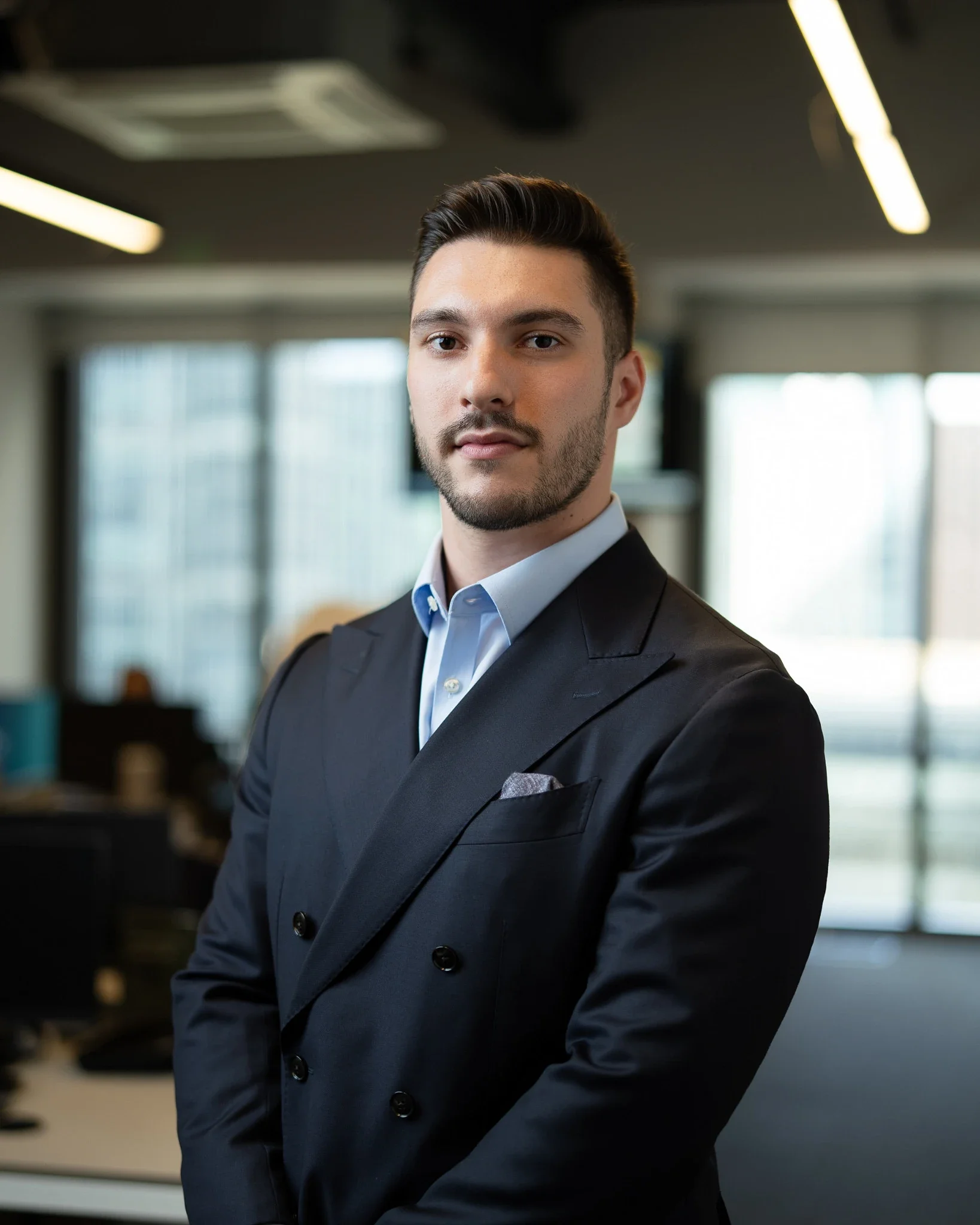Corporate headshots London, consistent studio backdrop, professional services firm, City of London