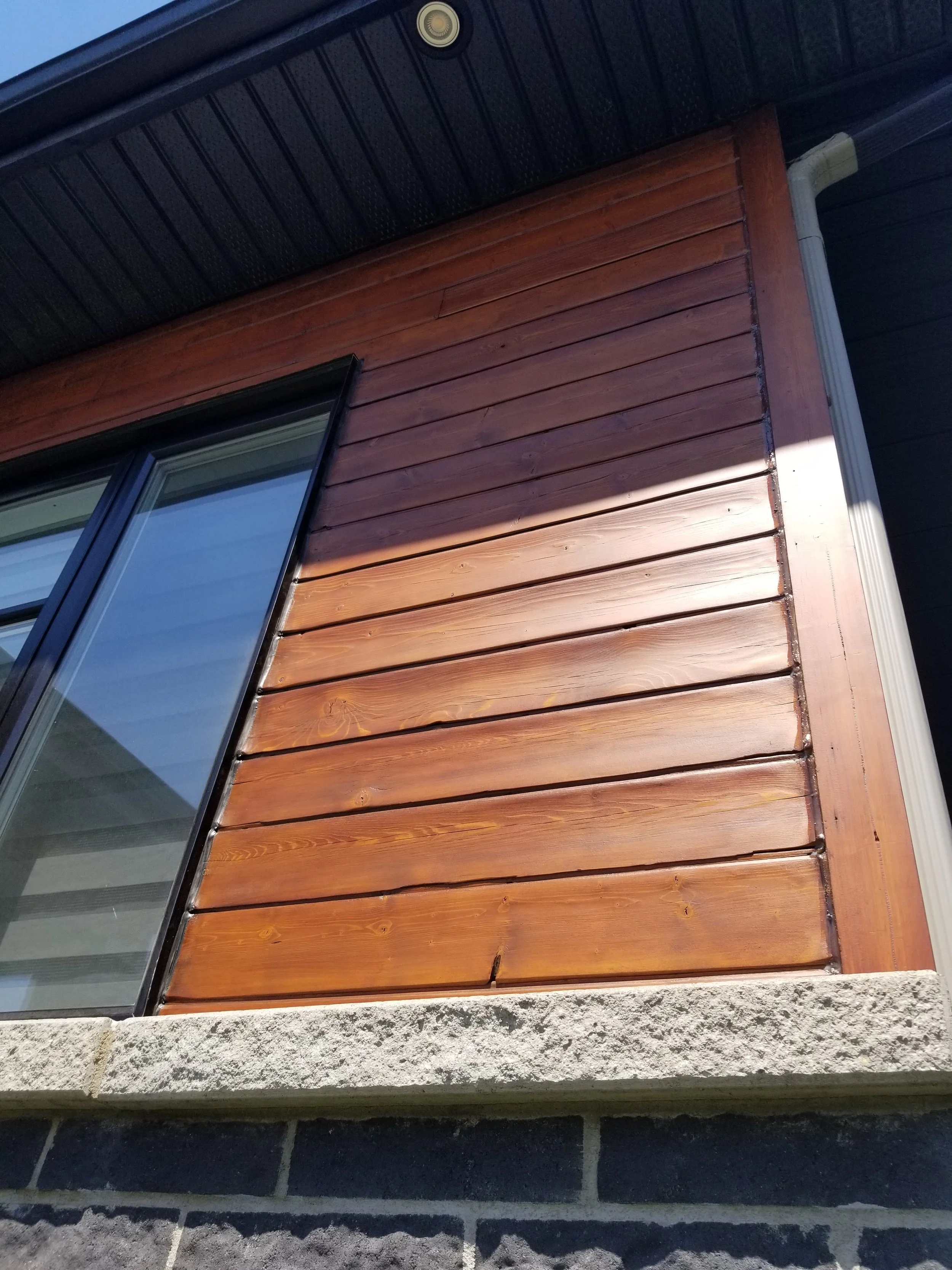 exterior siding protection with wood stainin Banff Alberta