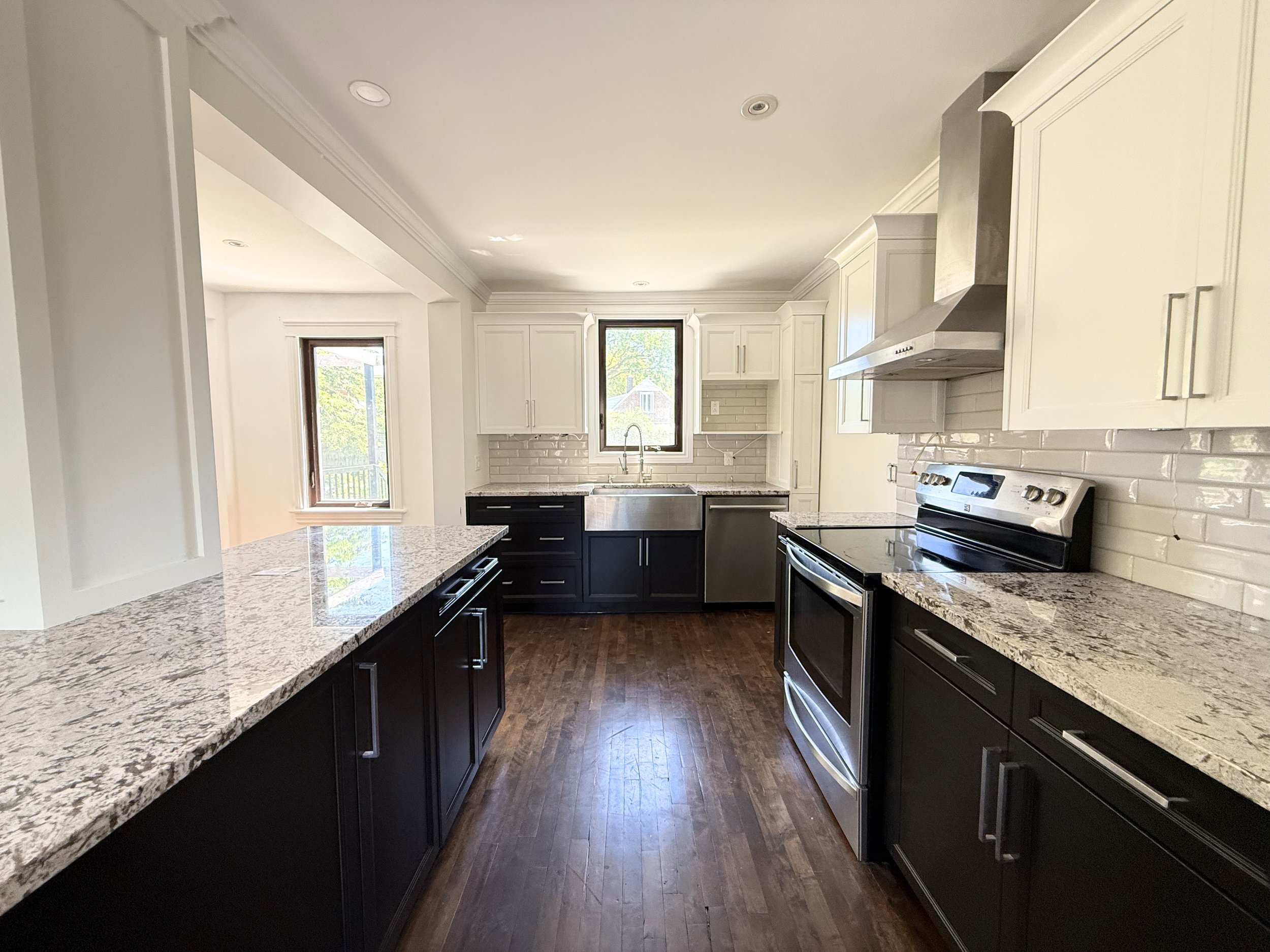 Cabinet refinishing by Final Coat Painting Inc., Canmore
