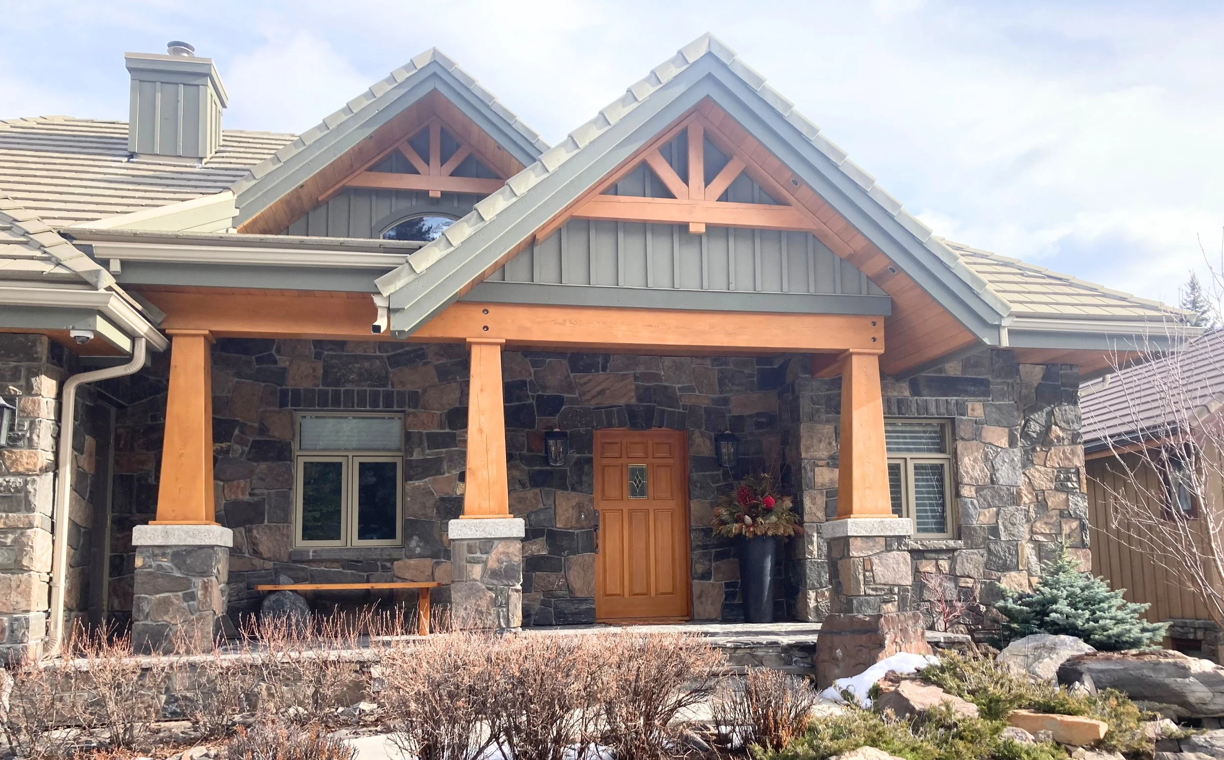 Exterior house painting in Canmore with durable coatings built for the Bow Valley mountain climate