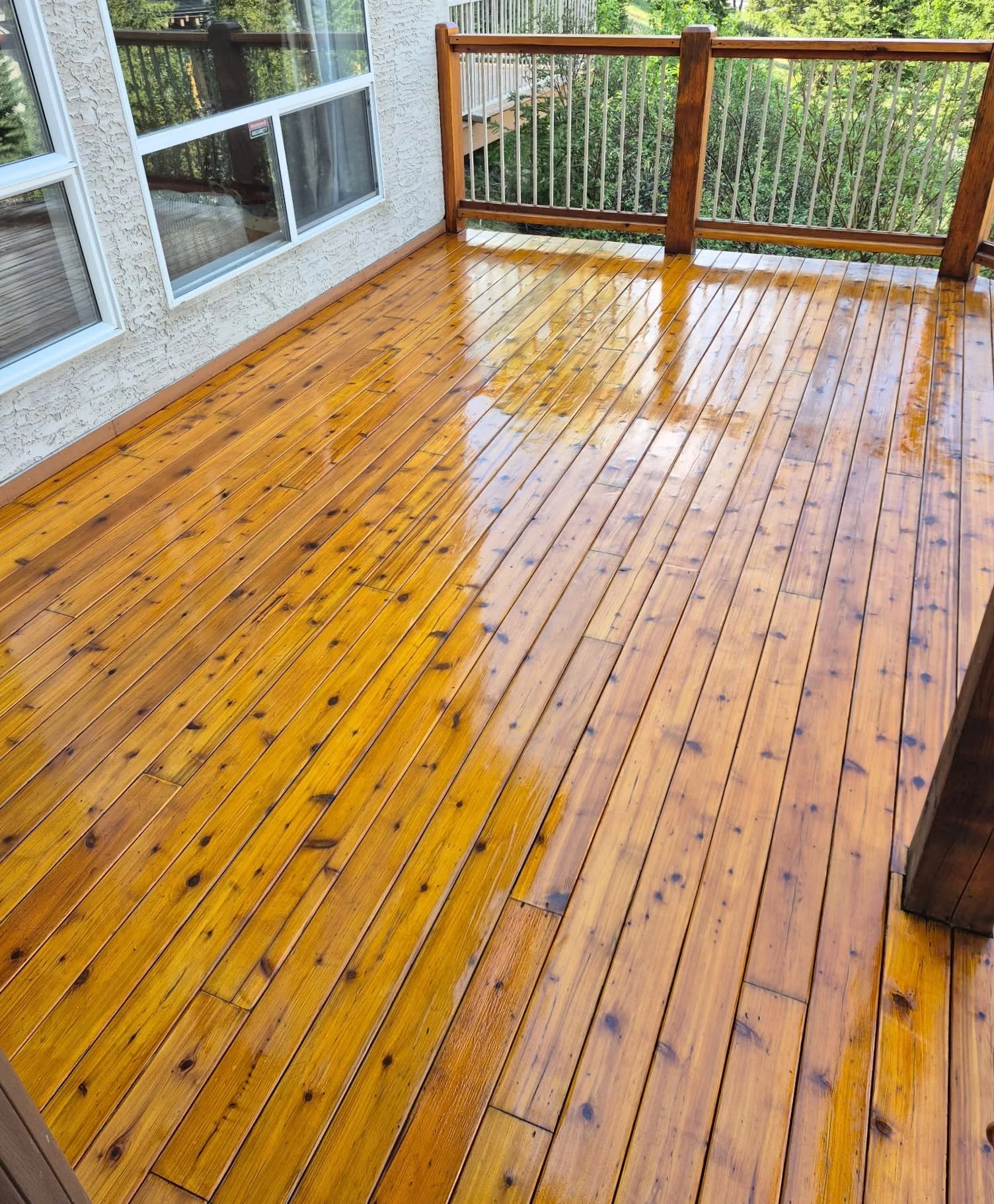 xterior wood sanding and oil-based staining project, Canmore AB