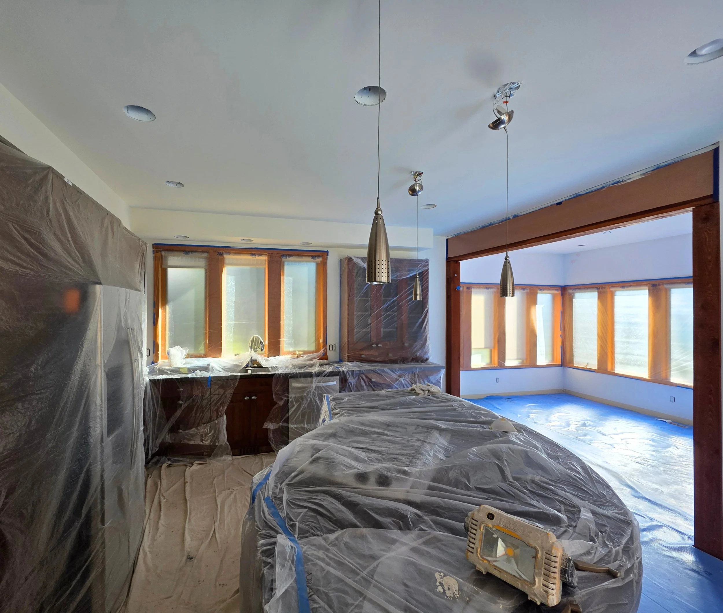Woodwork refinishing project in Canmore by Final Coat Painting