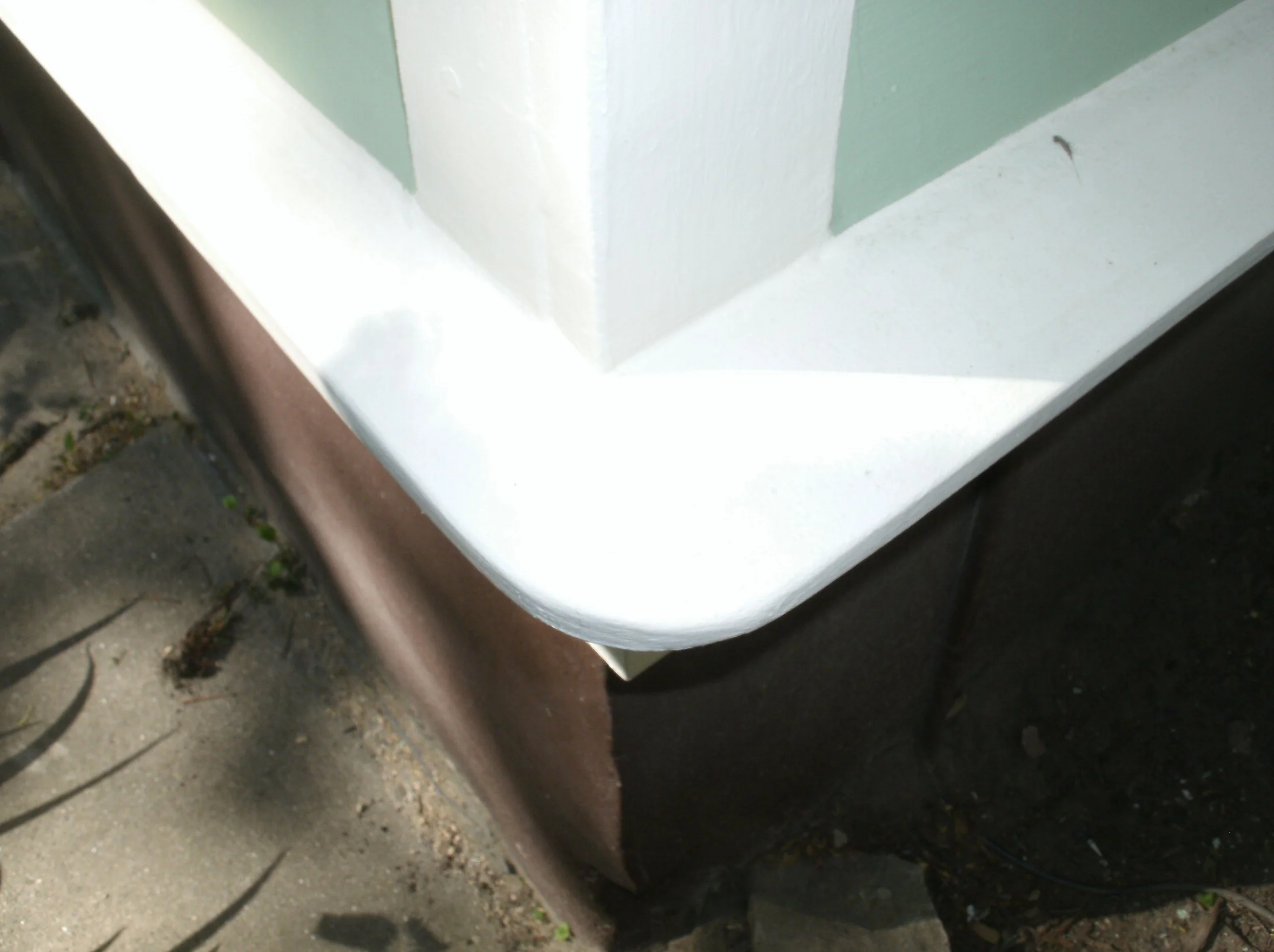 Drip edge corner rounded over to avoid injury adjacent to narrow walkway.