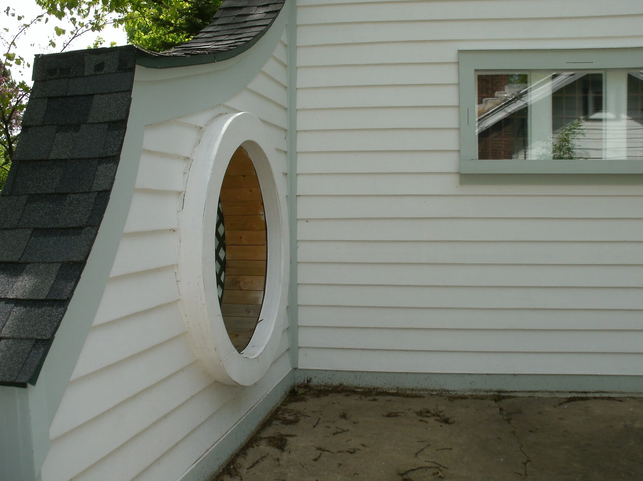 The rescued wing wall with new trim installed.