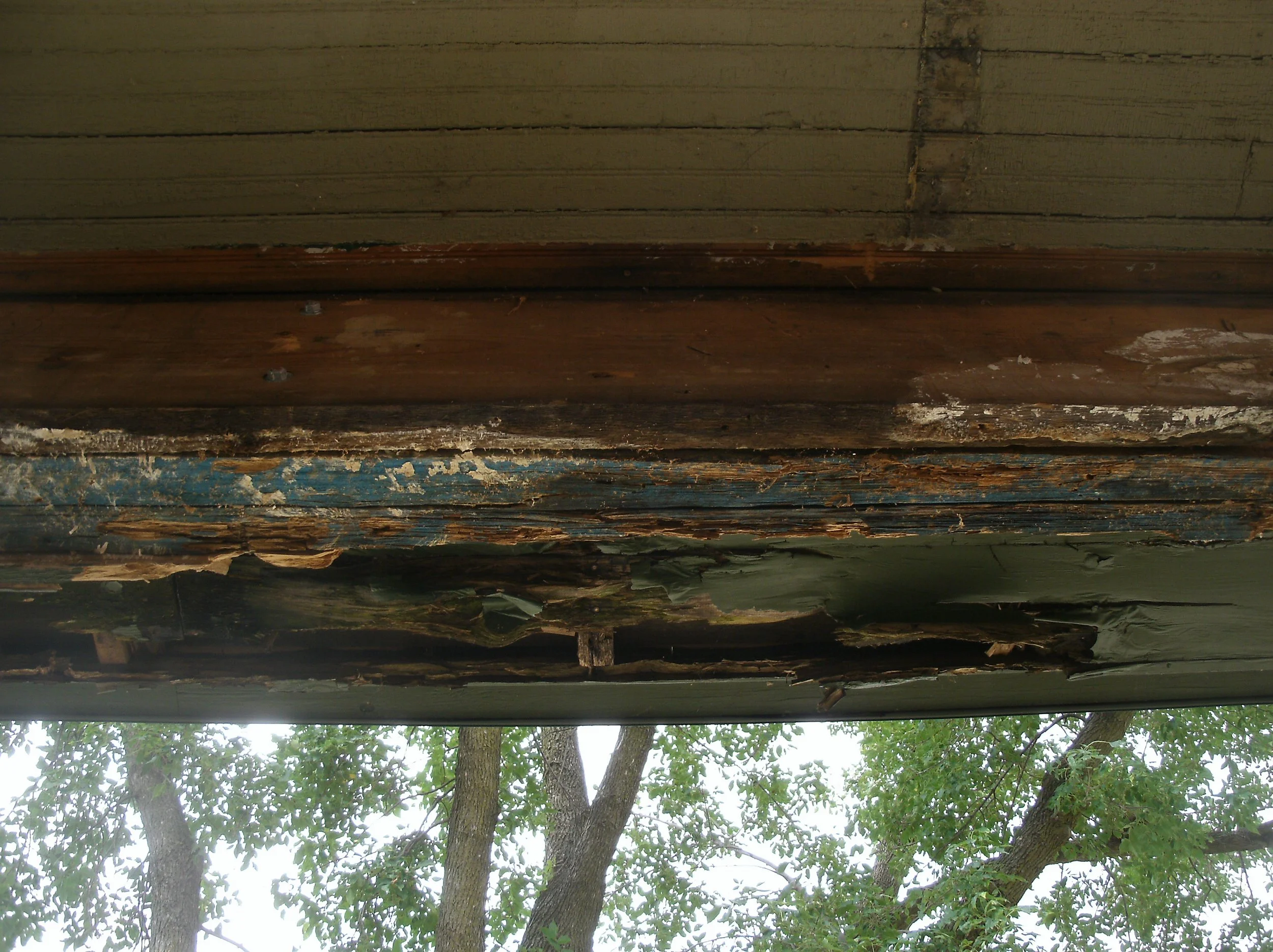Extreme water damaged east end beam of front porch.