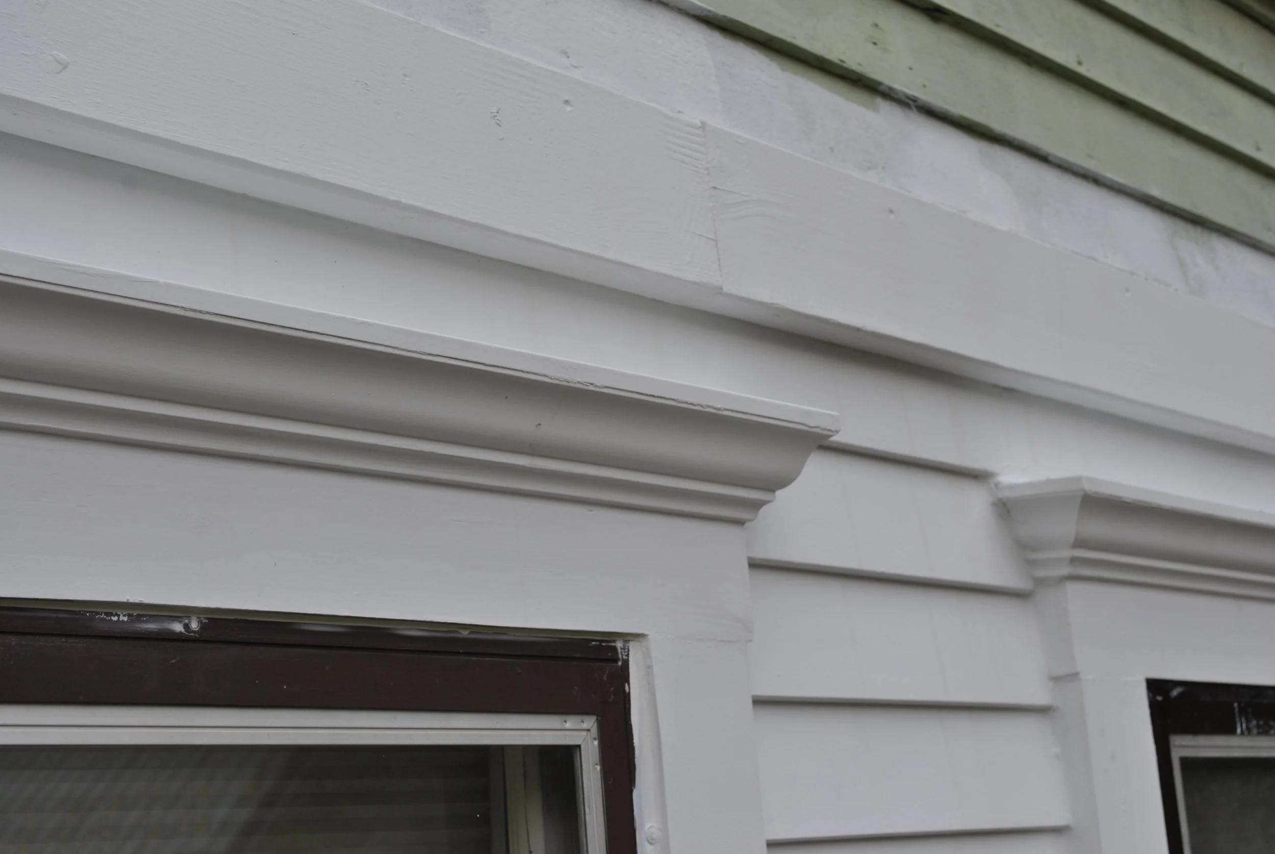 These are the two full-size windows. All white primed wood is new.