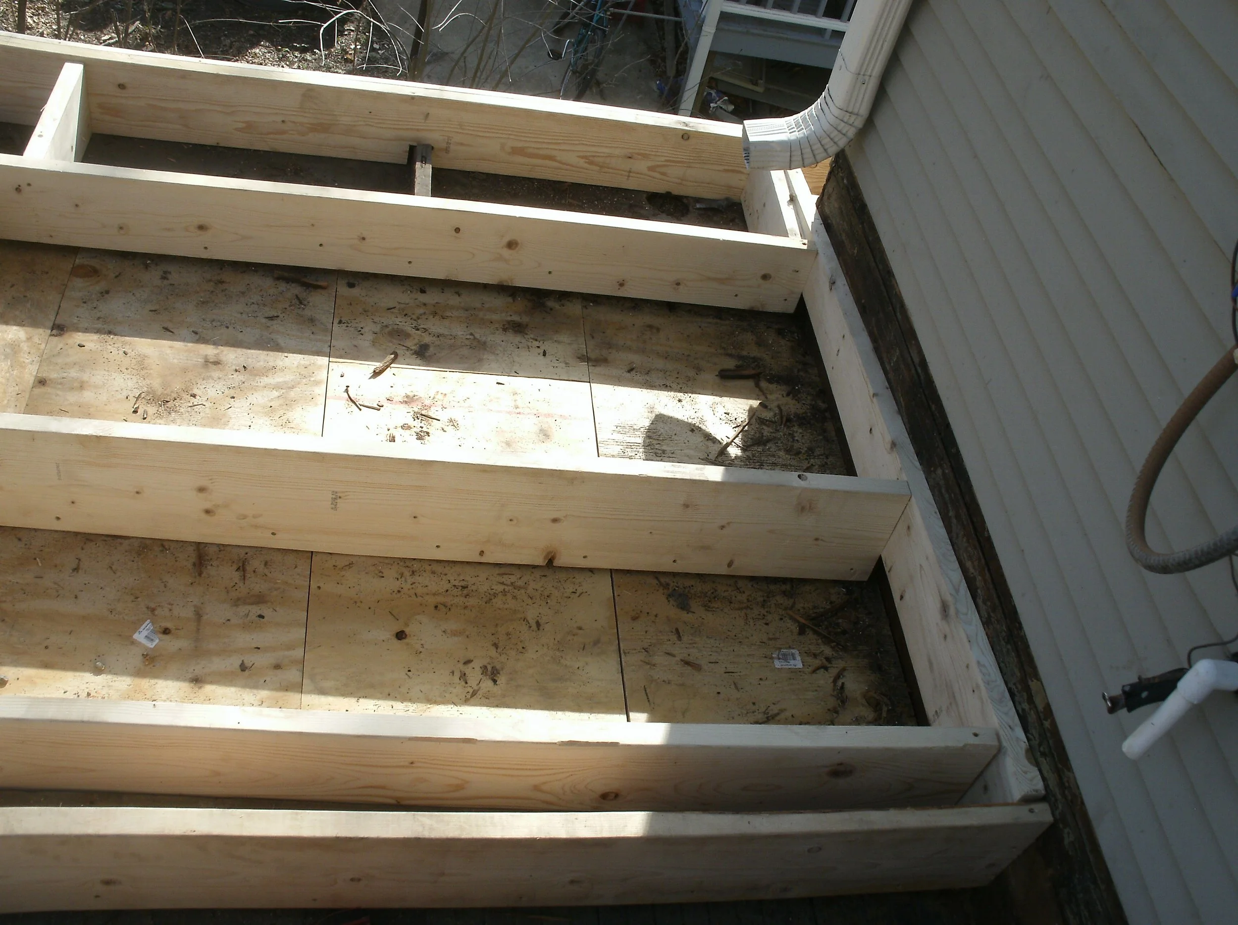I first had to replace rotted ceiling sheathing over the basement stairs.