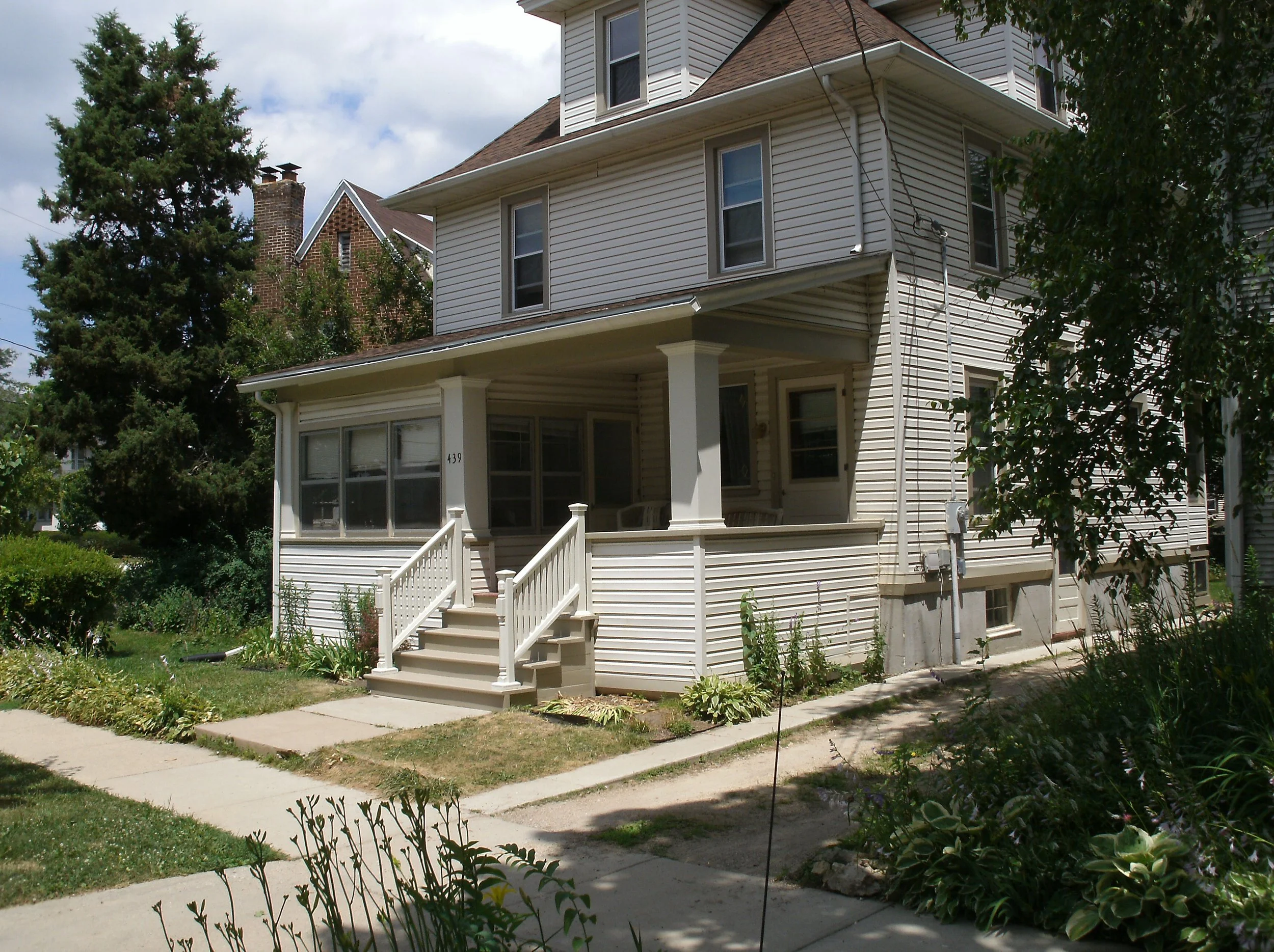 Another full view of the new stairs, post, knee wall cap.	