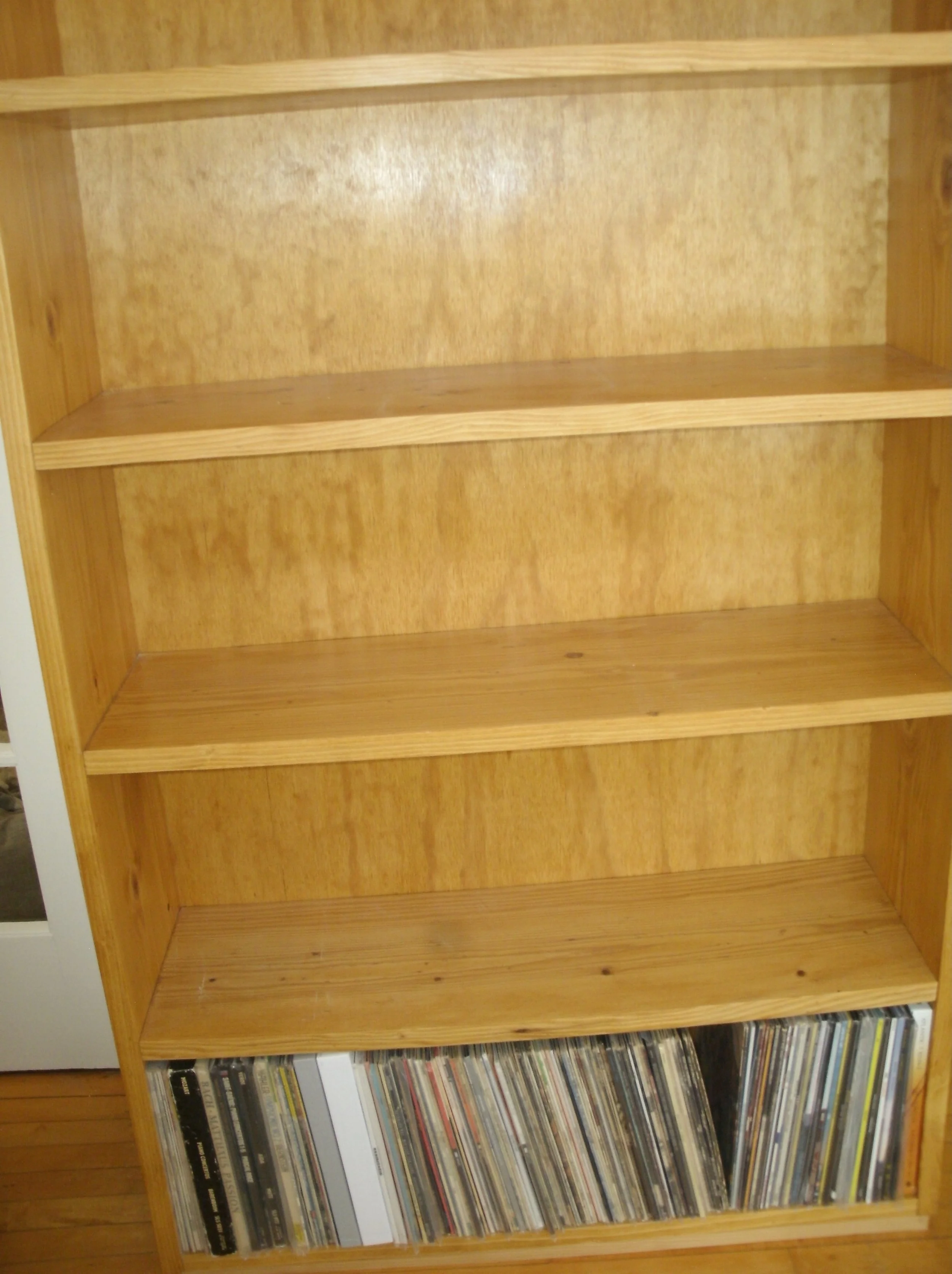 The other of the two freestanding shelf units