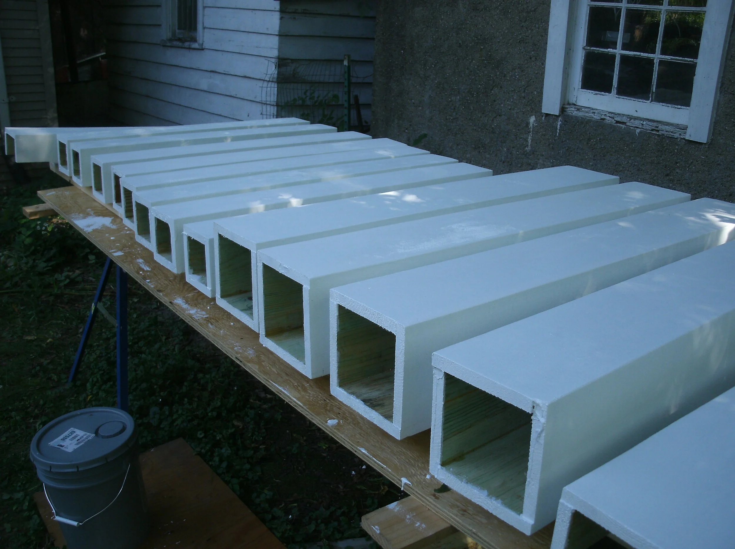 Post wraps fabricated, primed and painted.