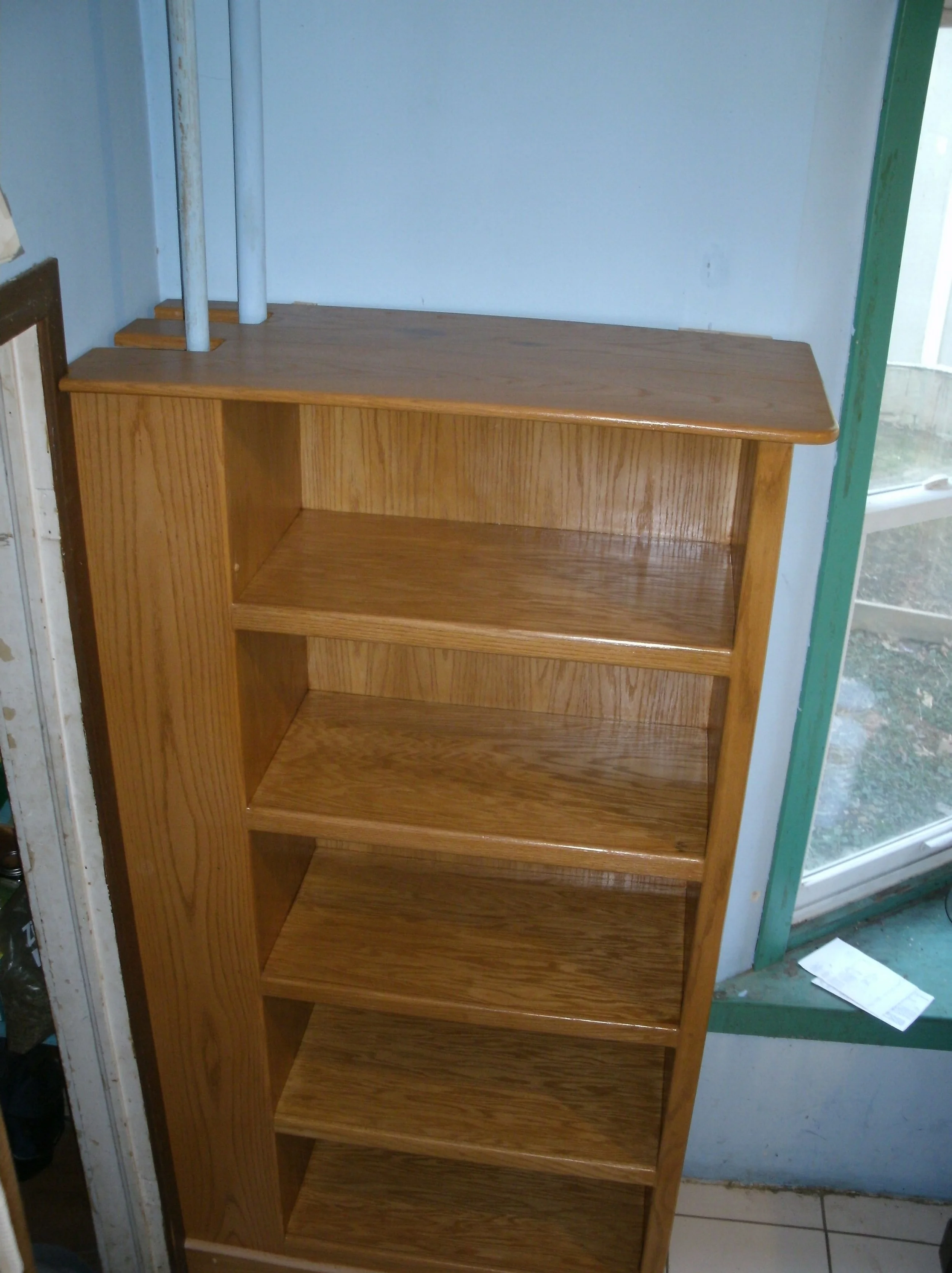 A second view of the kitchen food storage shelving