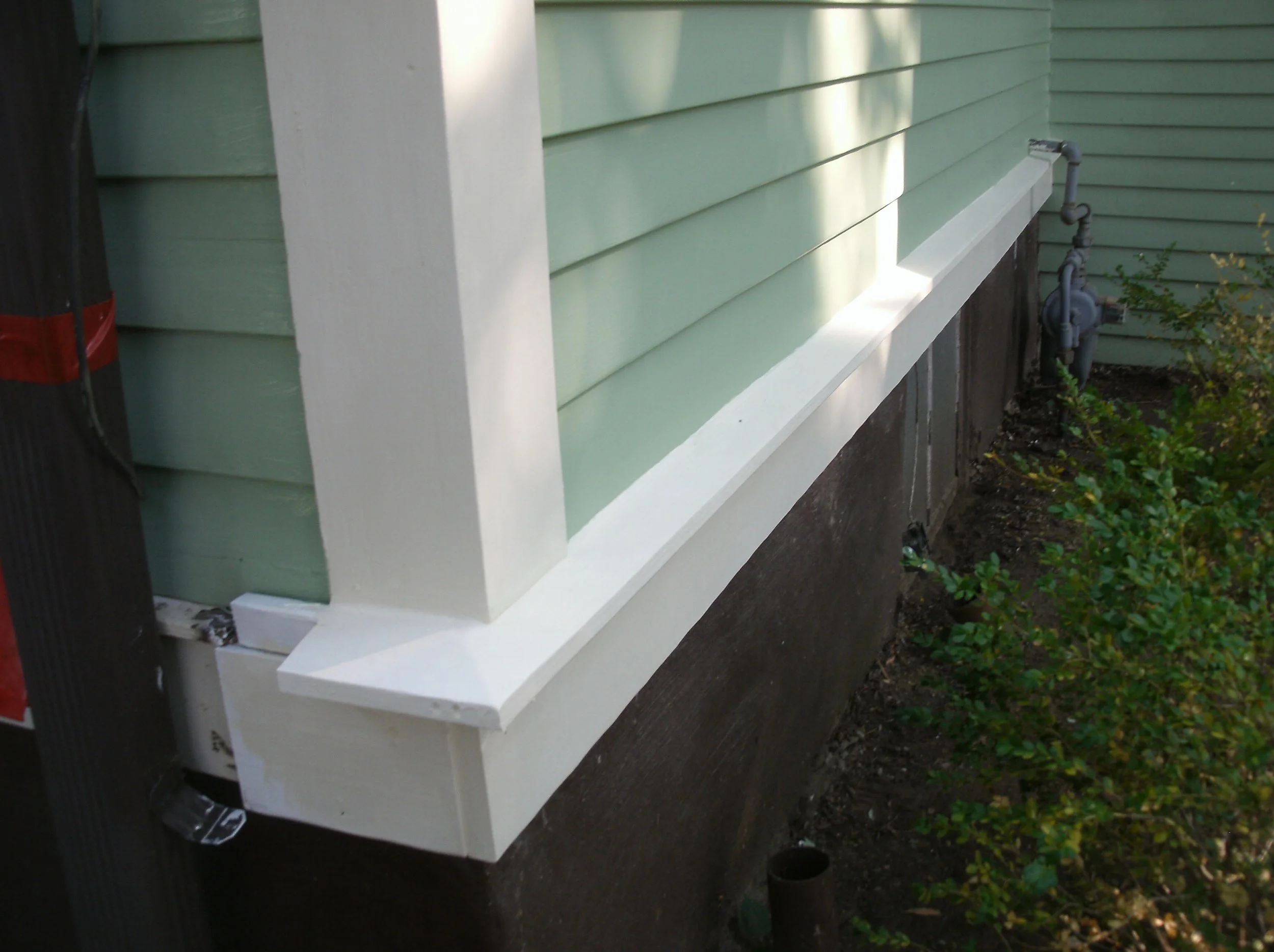 All new front window trim installed, caulked ready for priming