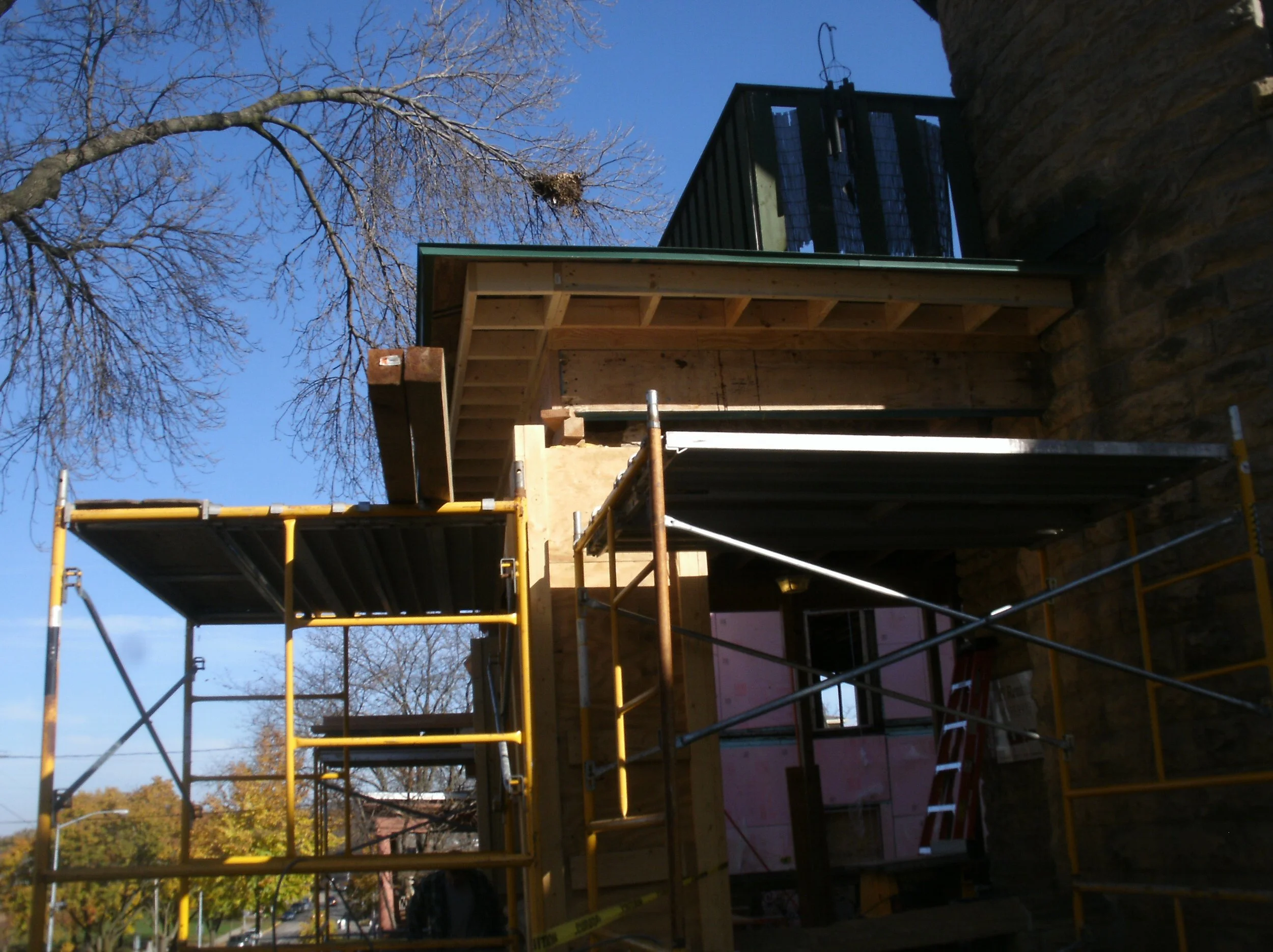 A second few of the beam and the rafter extensions in place.