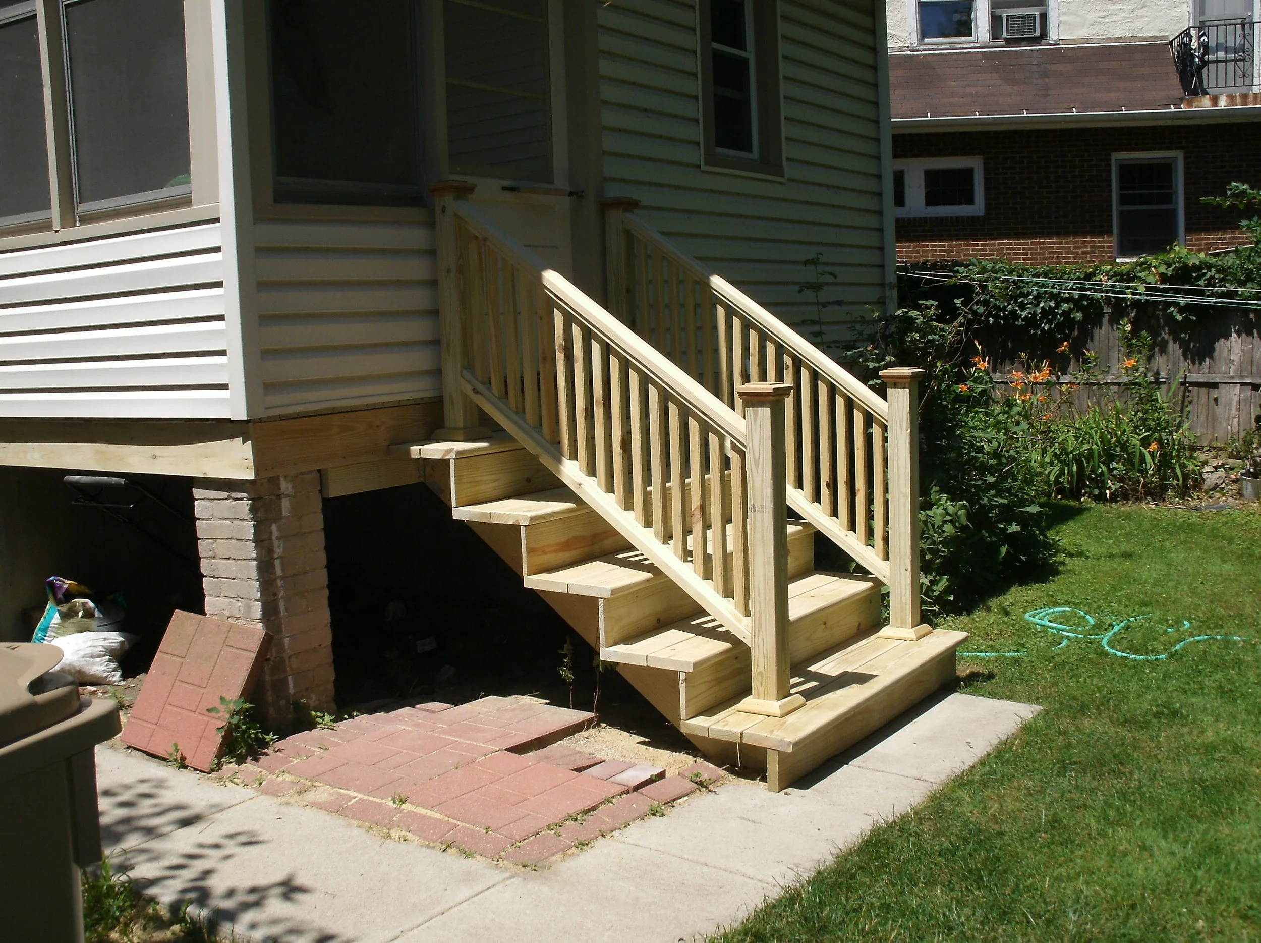 Beautiful new back stairs. Strong, generously sized treads, ultra strong rails.