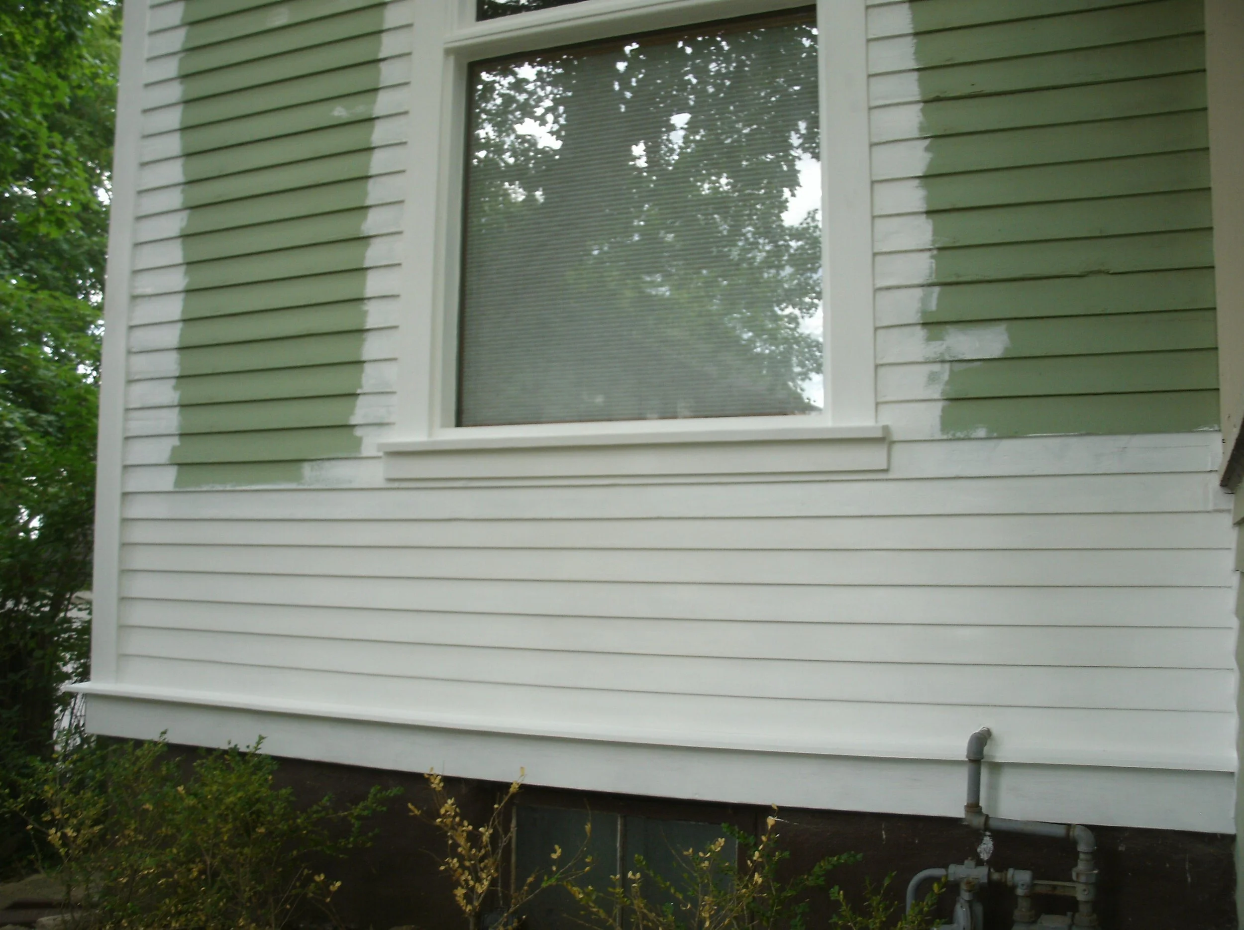 Full view of all the new wood installed and primed.