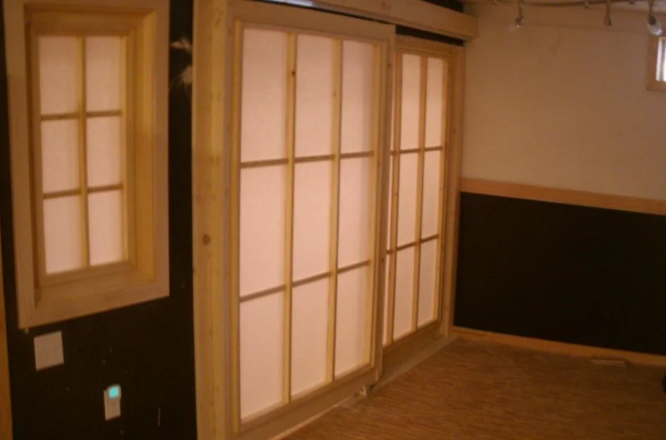 New doors in place, window in place view from the basement