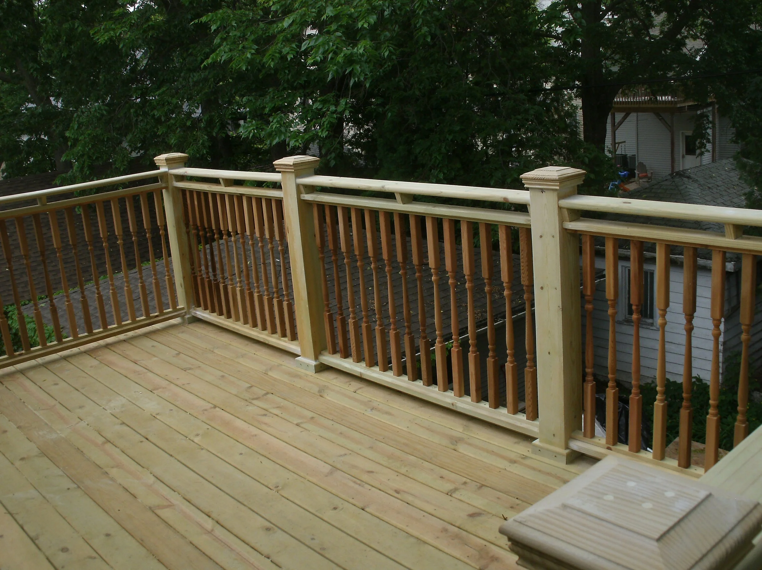 Rails installed. Correction: the balusters are cedar.